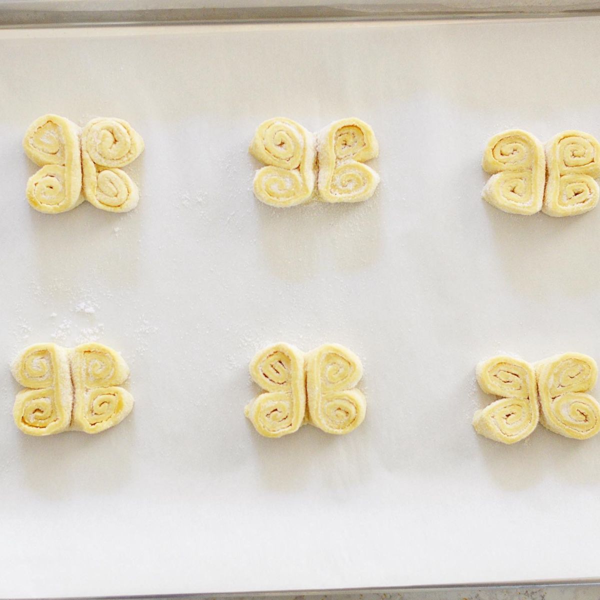 These French Palmier cookies are rolled in sugar and cut into little butterflies.
