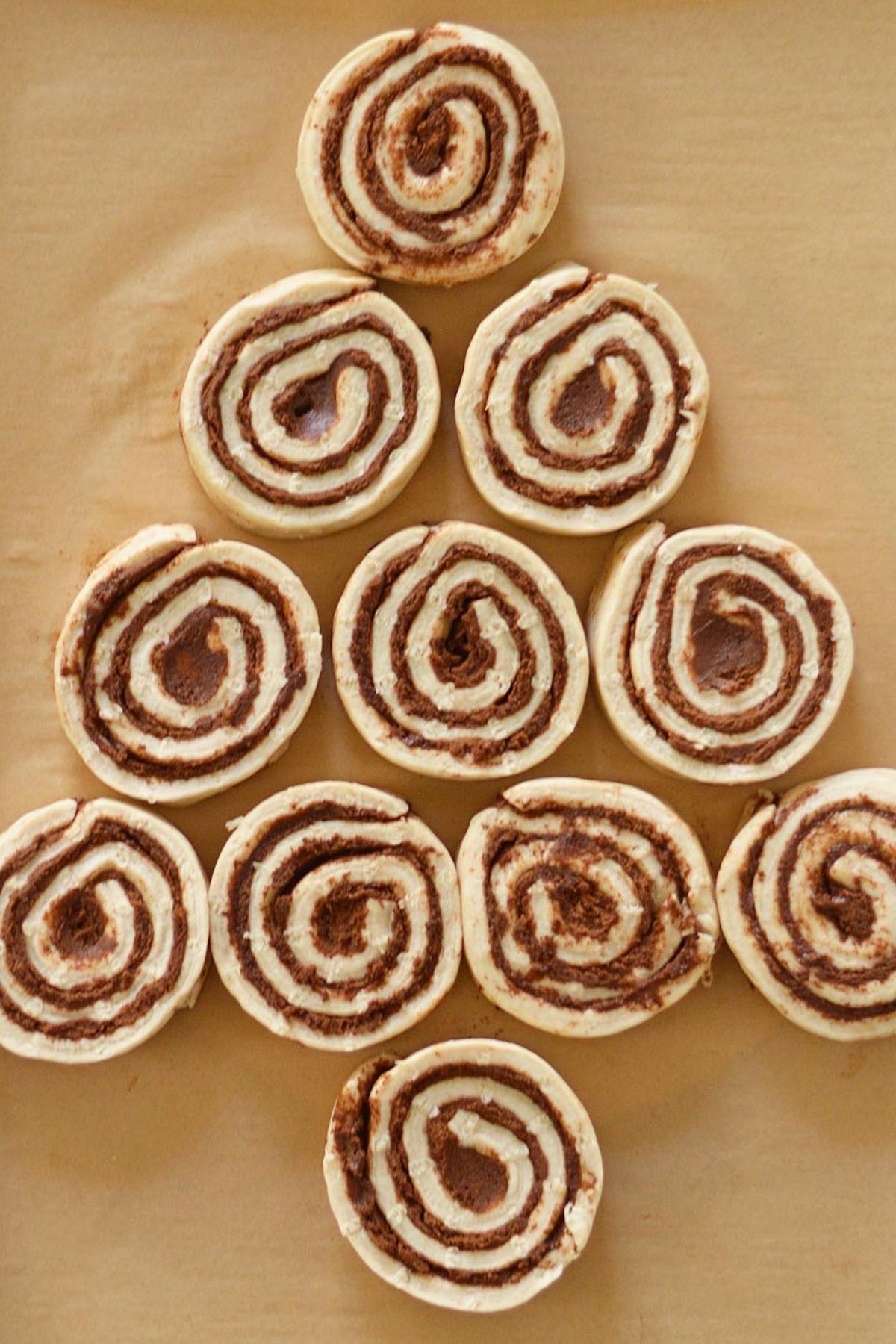 This Mickey cinnamon roll Christmas is the best treat to serve on Christmas morning.  Made with store bought cinnamon rolls and decorated with Mickey shaped string lights.  