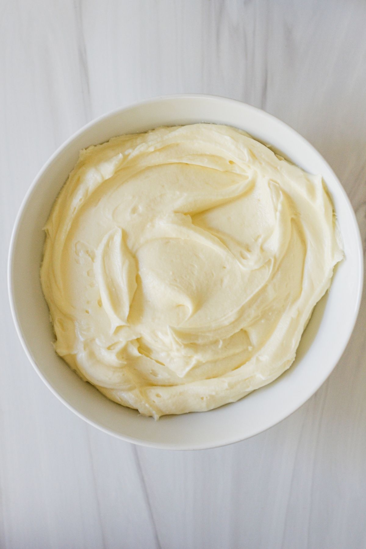 Cream cheese frosting is made with cream cheese, powdered sugar, vanilla and butter.