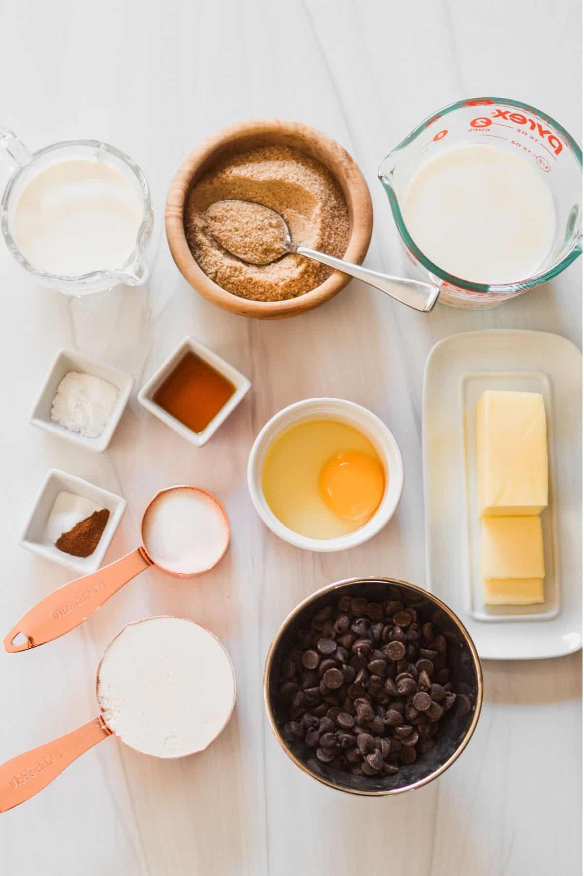 Ingredients for churro pancakes and cinnamon chocolate sauce.