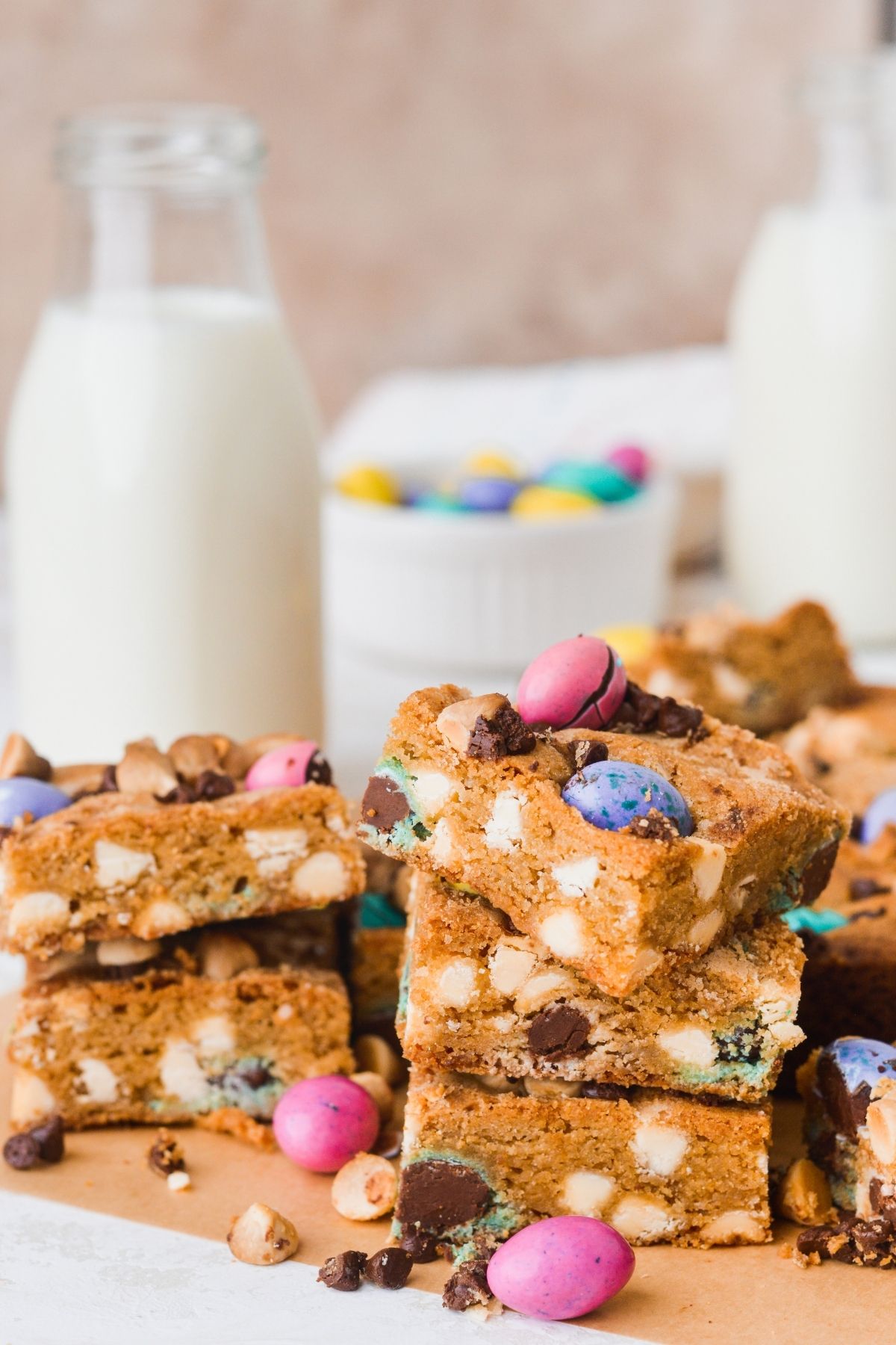 Easter mini egg cookie bars loaded with white chocolate chips and M&M chocolate eggs.