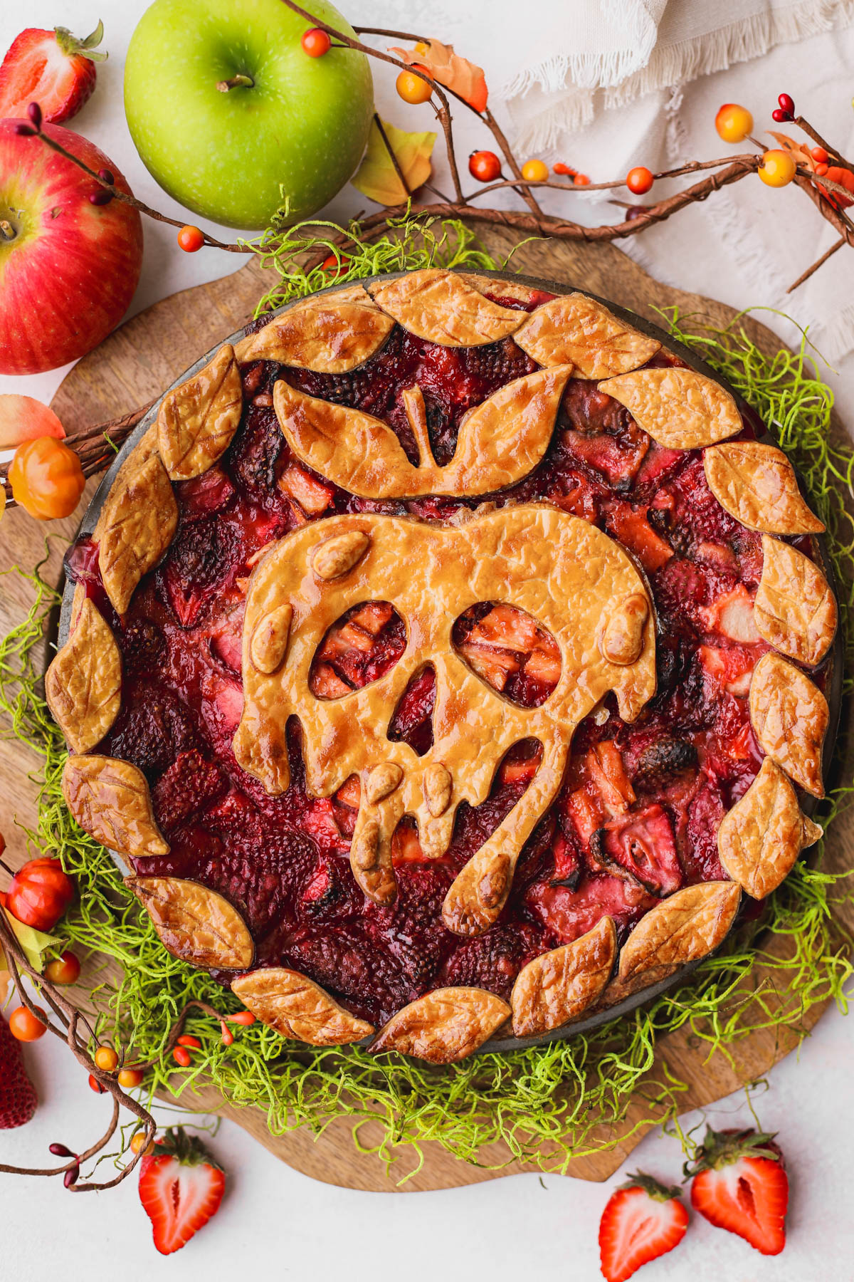 Strawberry apple pie inspired by Disney's Poison Apple.  Made with fresh strawberries, apples and baked inside a buttery, flaky crust.  