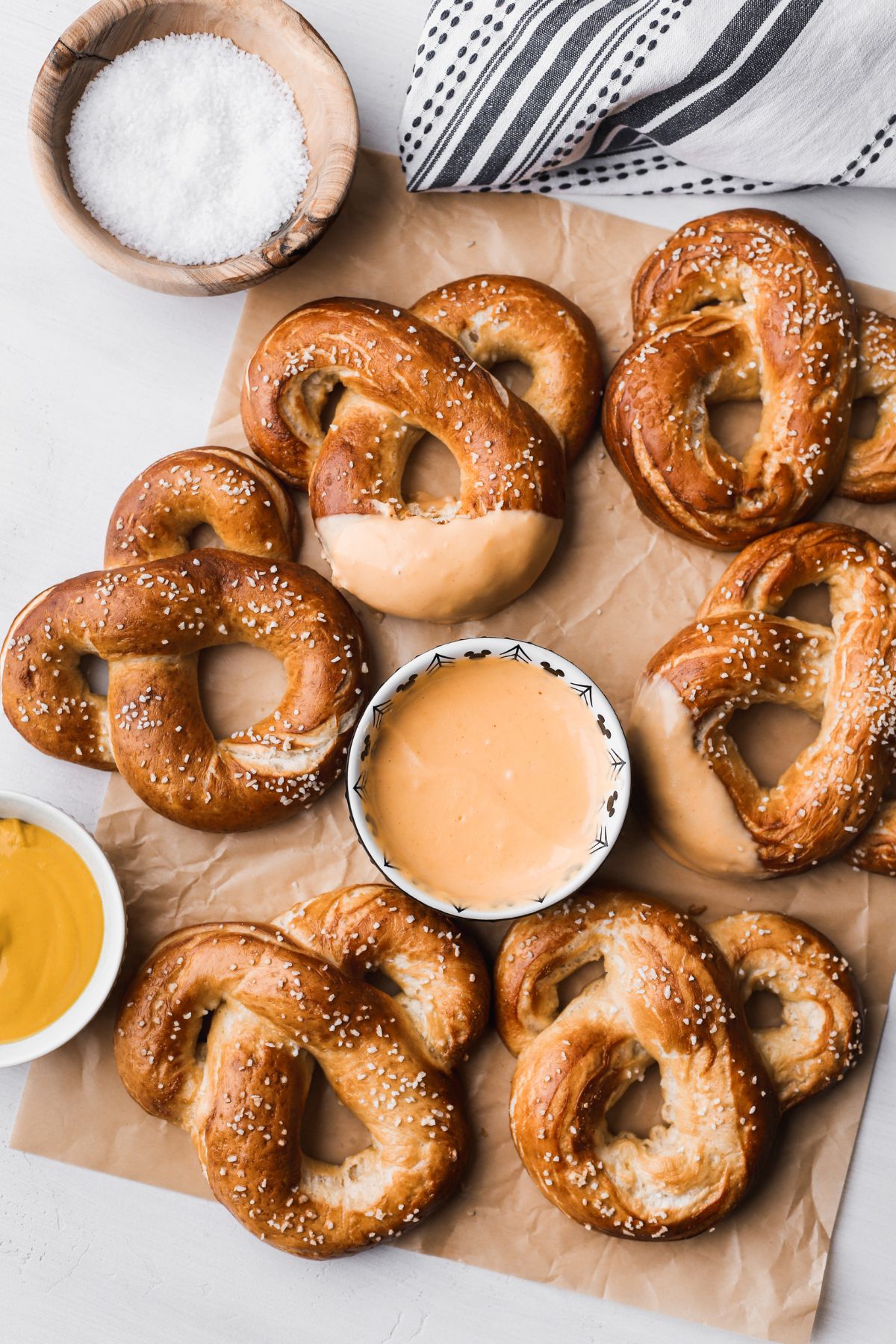 Mickey pretzels served with a cheesy mustard dipping sauce.