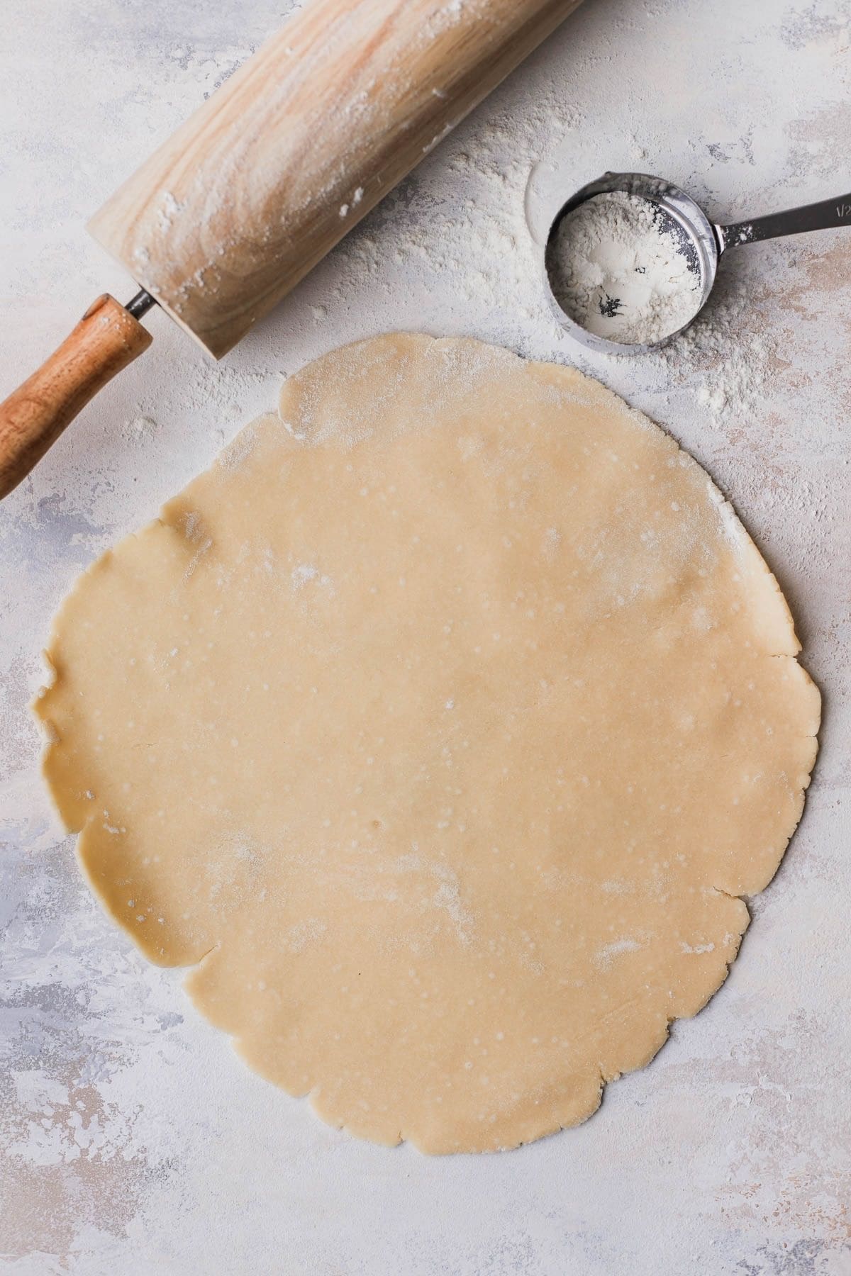 Rolled out pie dough circle.