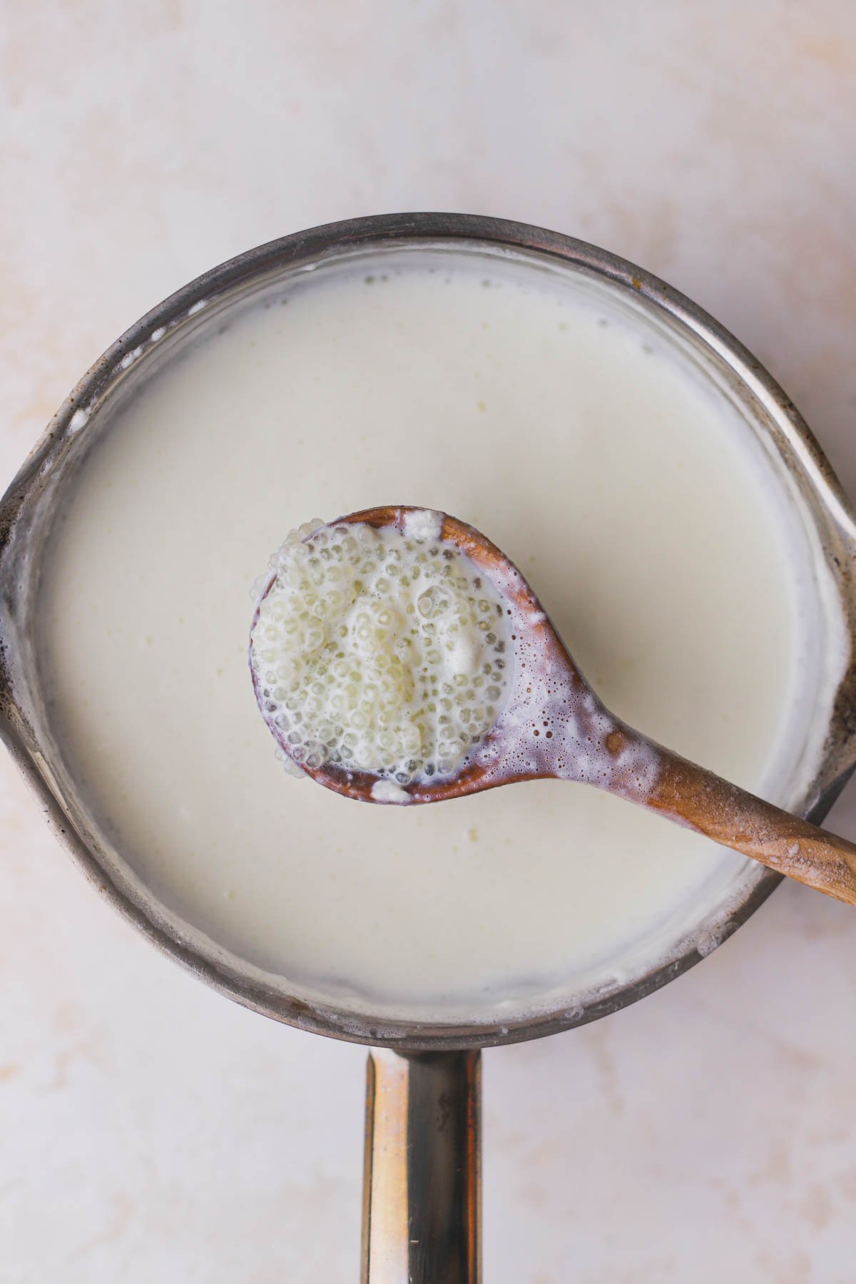 Cooked tapioca pearls and coconut mixture.