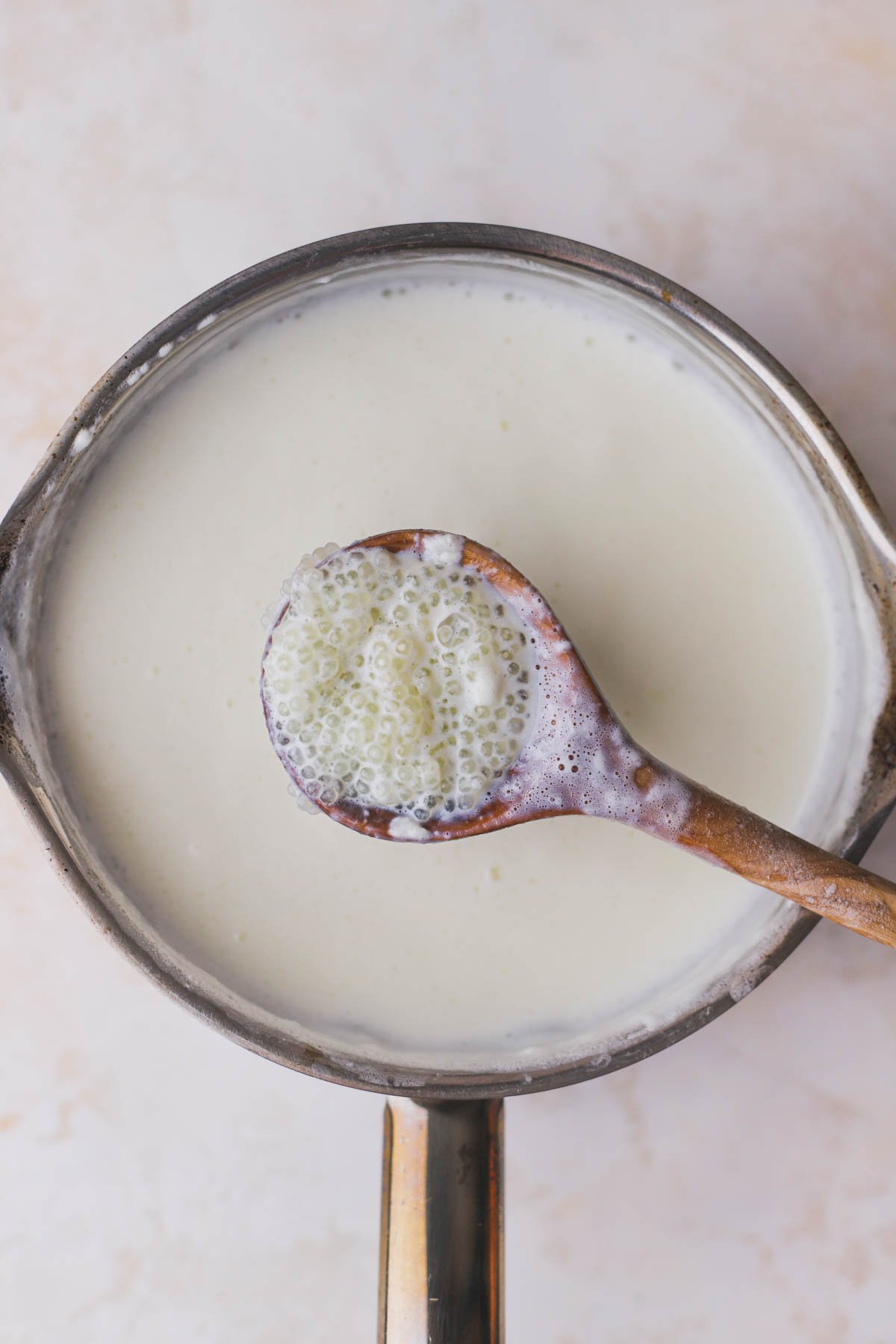 Cooked tapioca pearls and coconut mixture.  