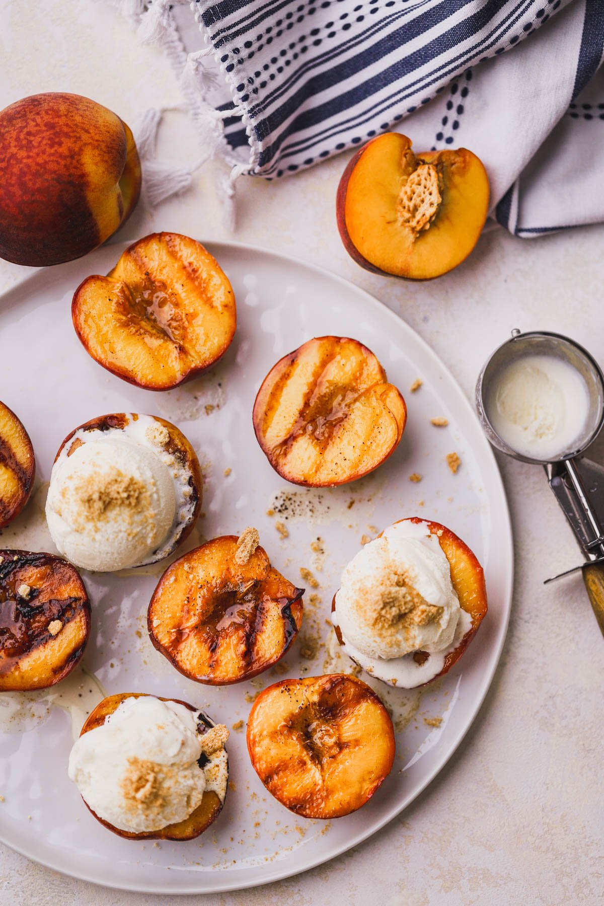 Caramelized peaches brushed and drizzled with brown butter and cinnamon.