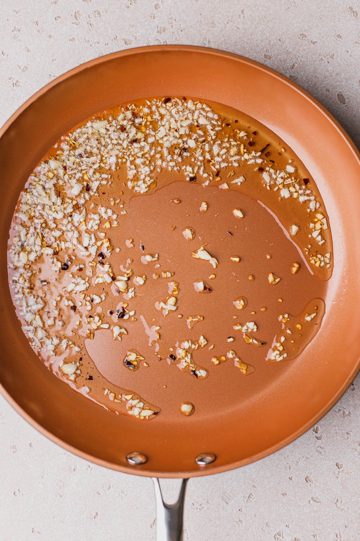 Sautéed garlic and crushed red pepper flakes.