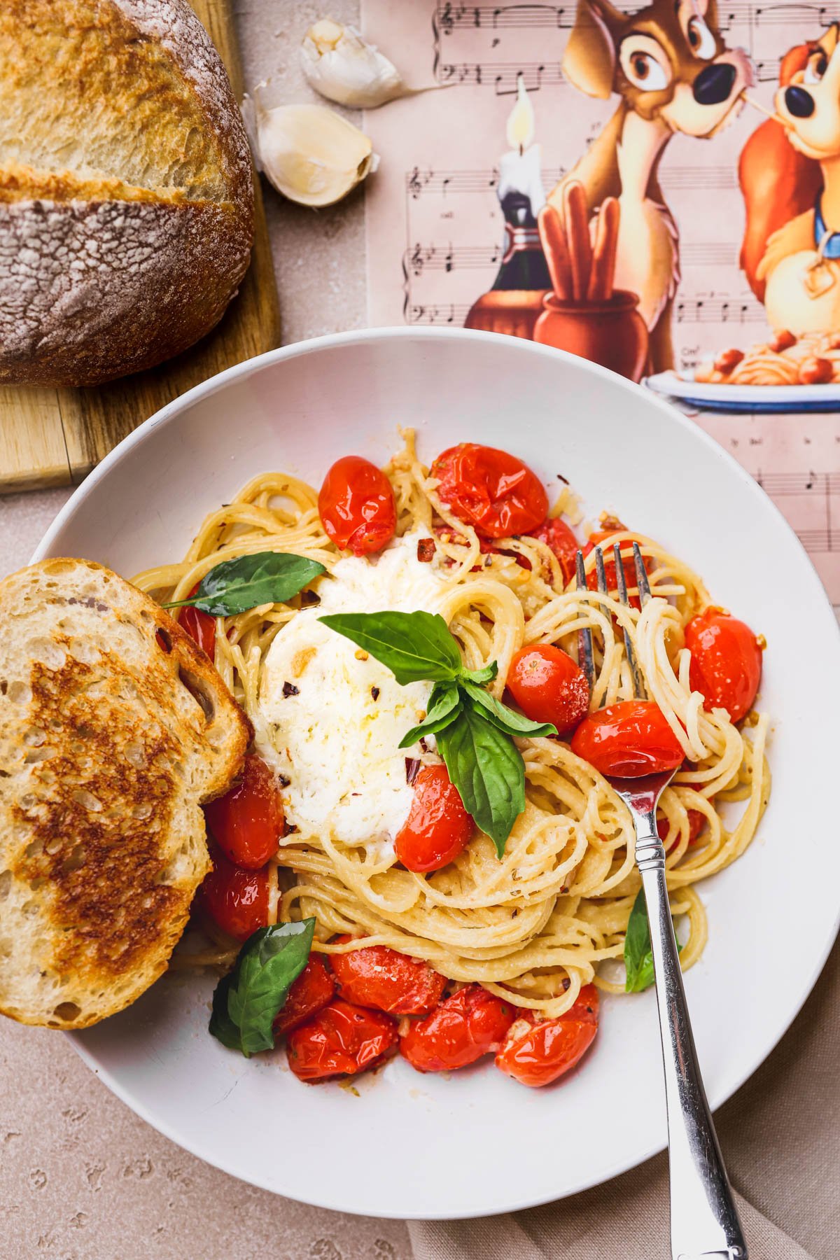 Spaghetti with cherry tomatoes, garlic, basil and mascarpone cheese.  