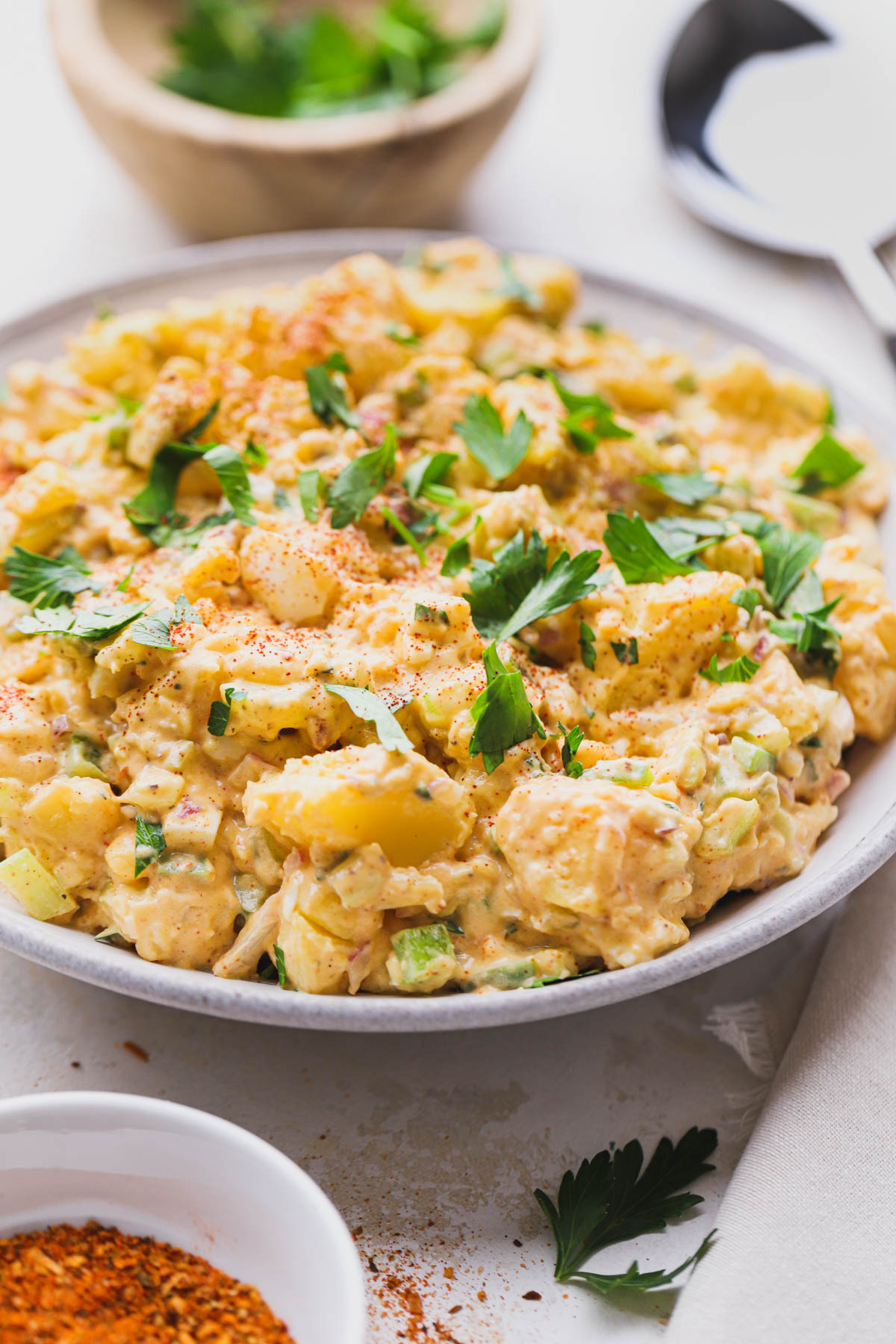 This cajun potato salad is made with chunky gold potatoes and a creamy dressing.  