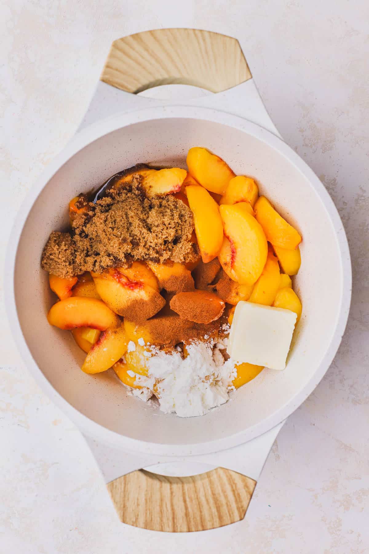 Peaches, brown sugar, lemon juice, butter, corn starch, cinnamon and vanilla.