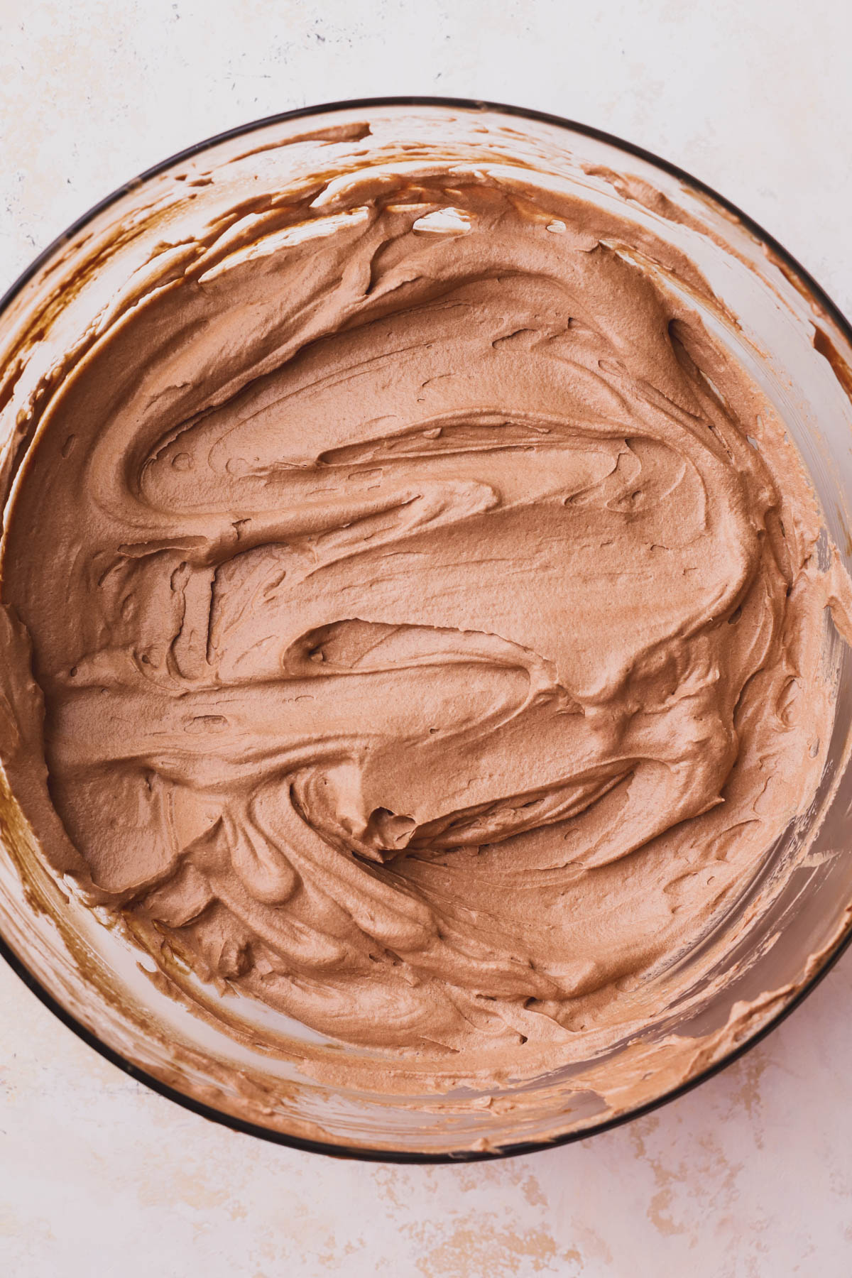Chocolate mixture combined with whipped cream. 