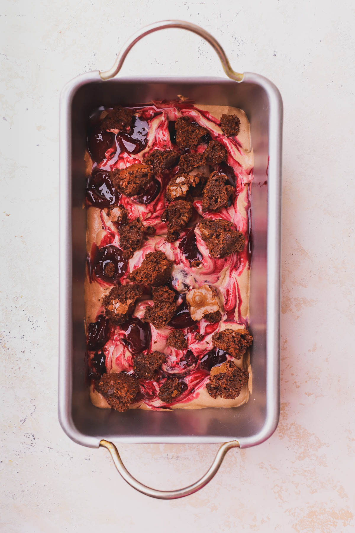Chocolate ice cream, brownie pieces and cherry compote. 