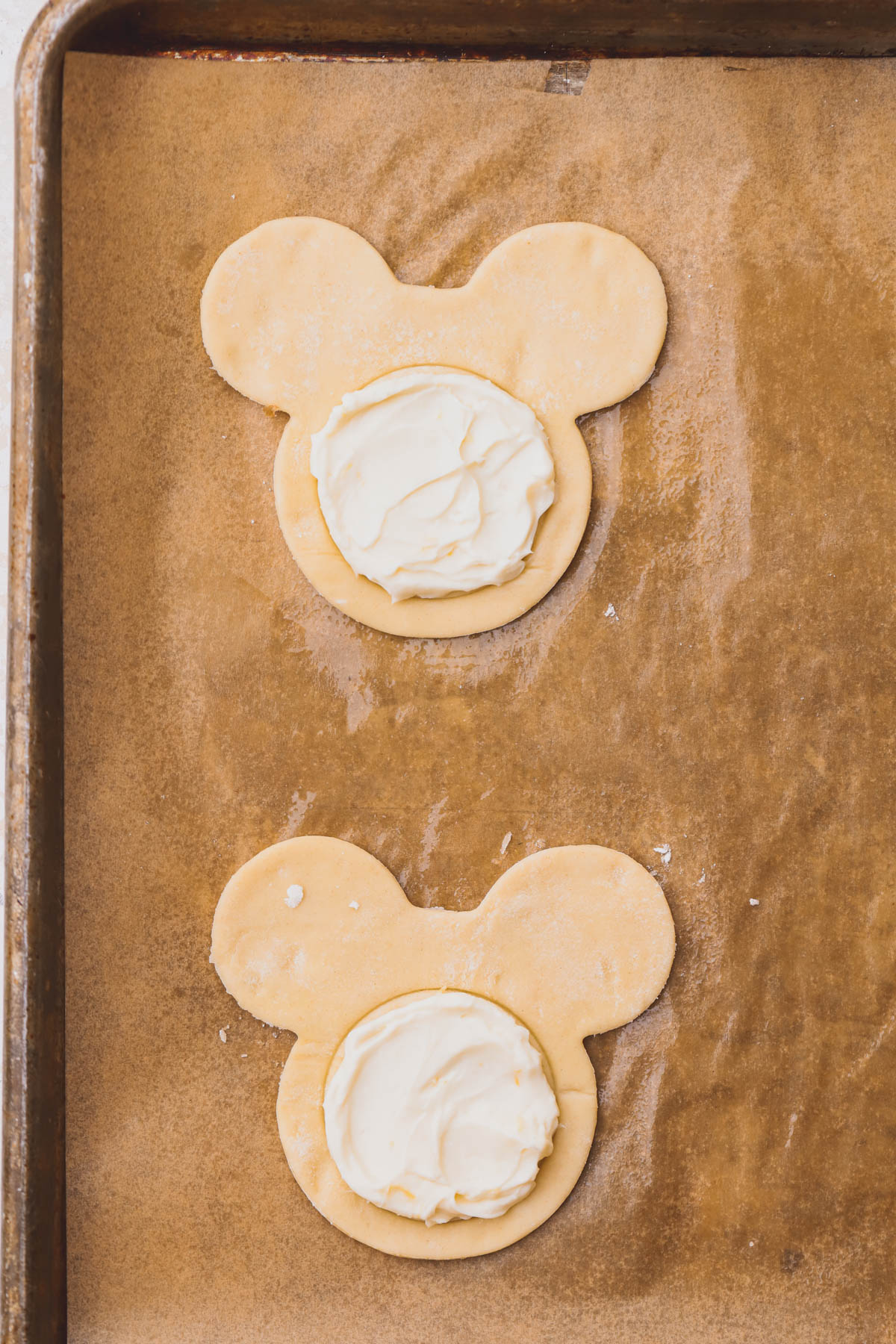 Mickey shaped puff pastry topped with lemon cream cheese.  