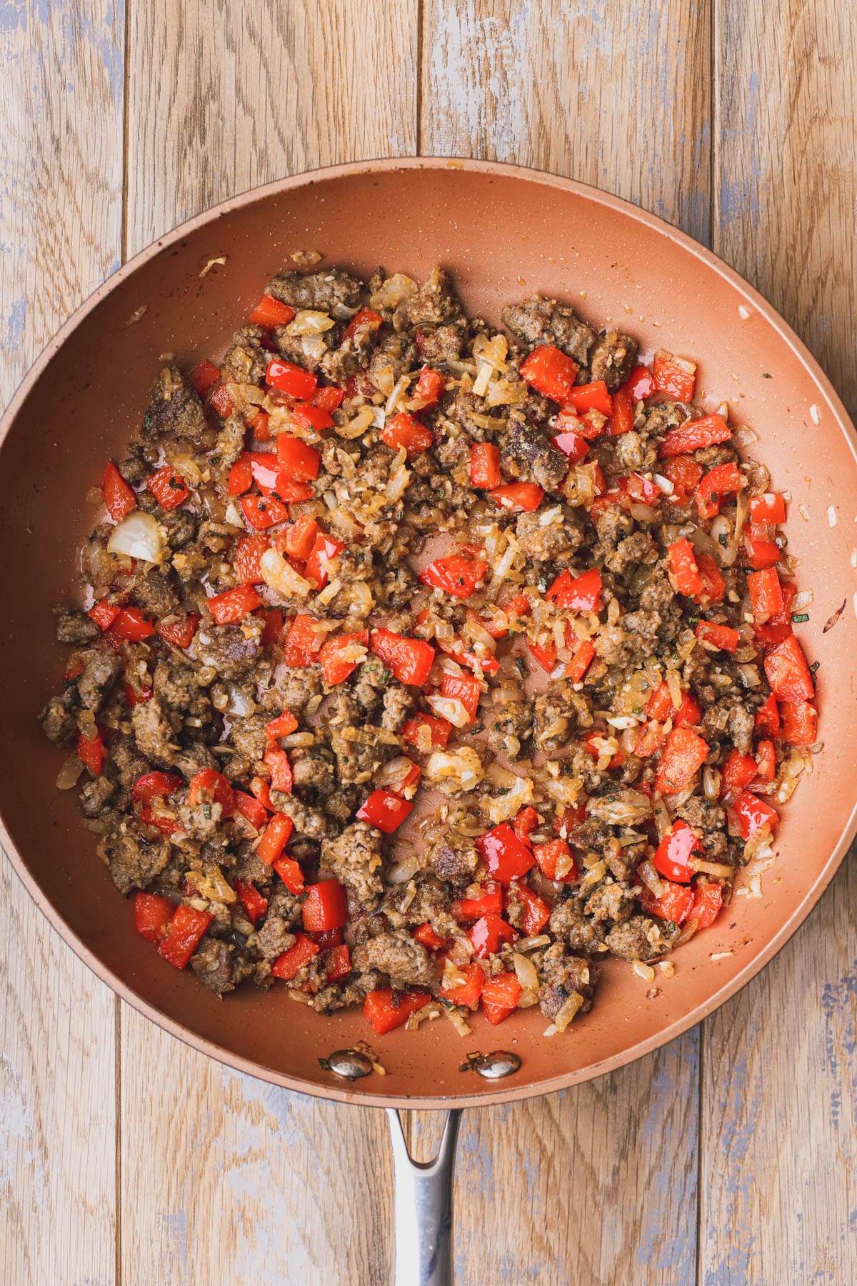 Caramelized onions, bell pepper and turkey sausage.  