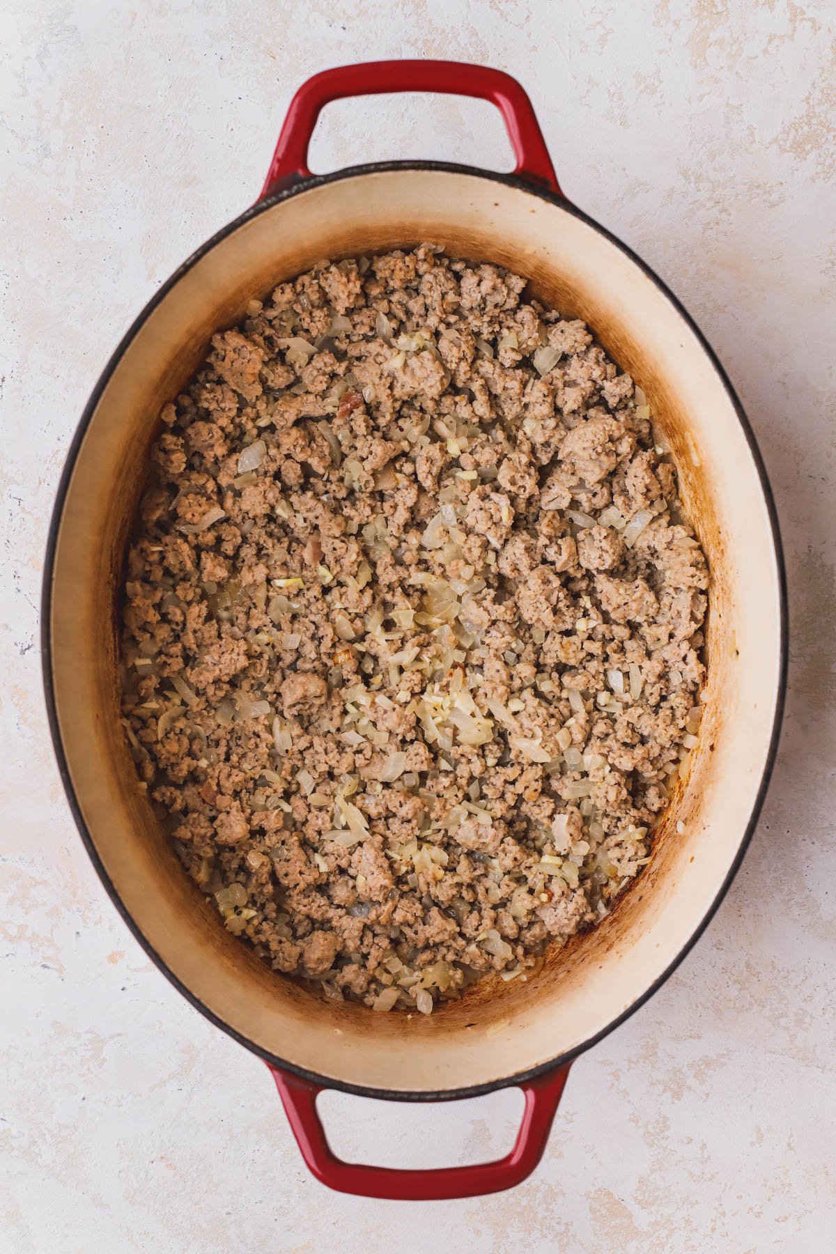 Cooked ground turkey and onions.