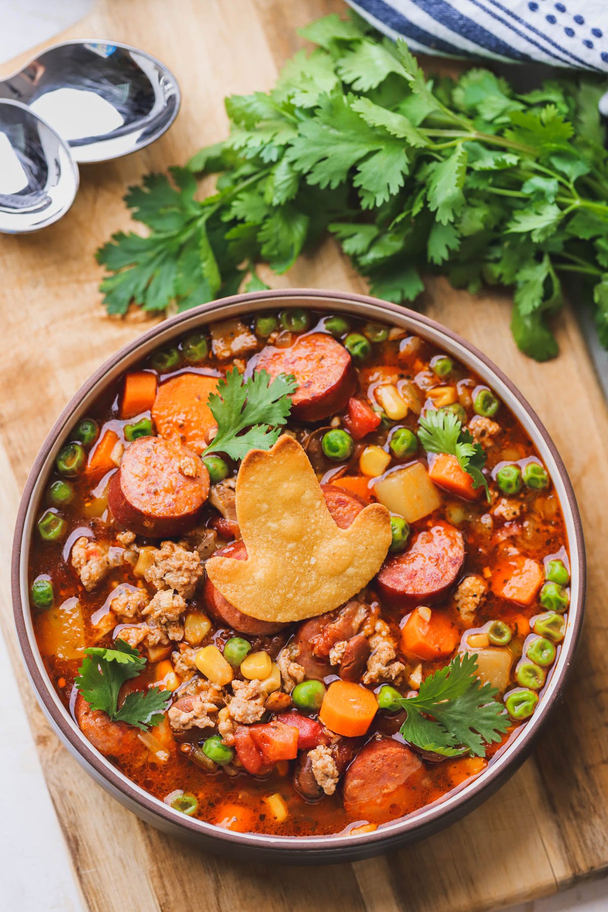 Cowboy soup with ground turkey, kielbasa, bacon, beans, veggies and a spicy tomato broth.