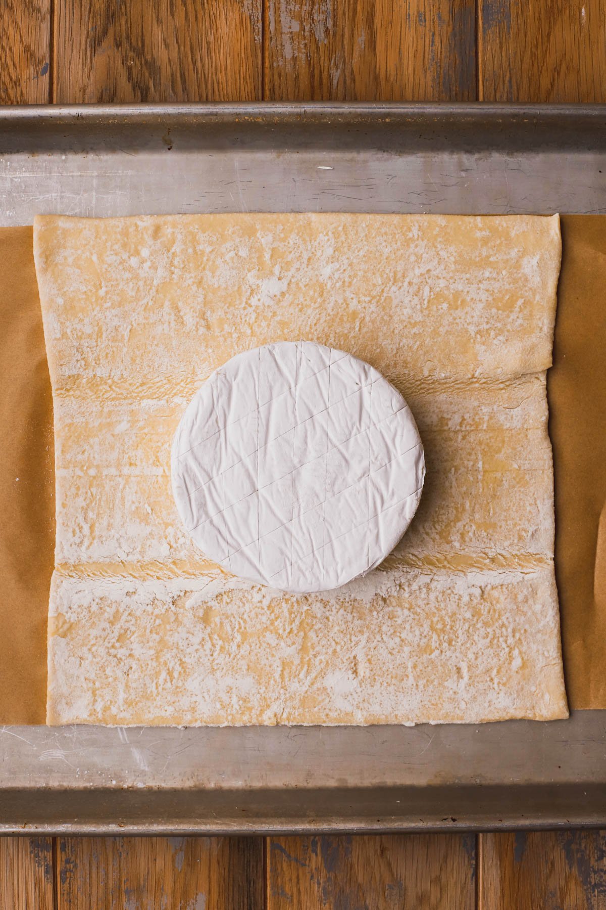 Brie in the center of rolled out puff pastry.