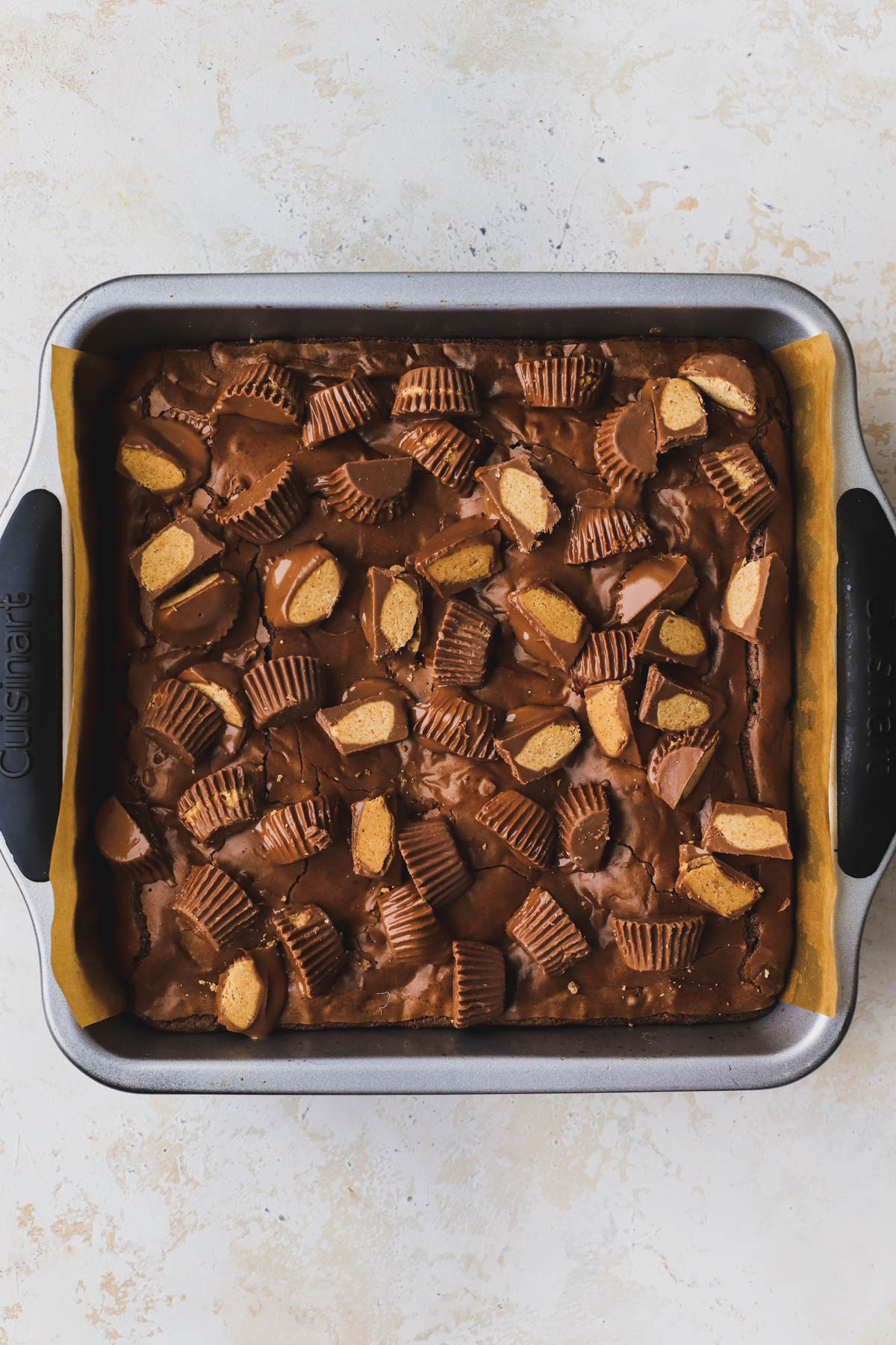 Baked peanut butter cup brownies, topped with additional peanut butter cups.  