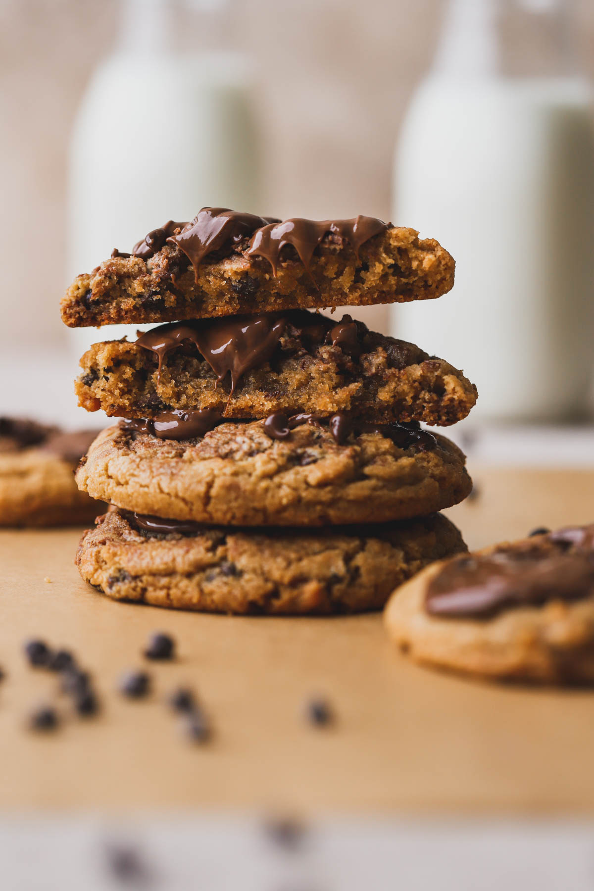 Stacked peanut butter Nutella cookies with melted Nutella on top.  