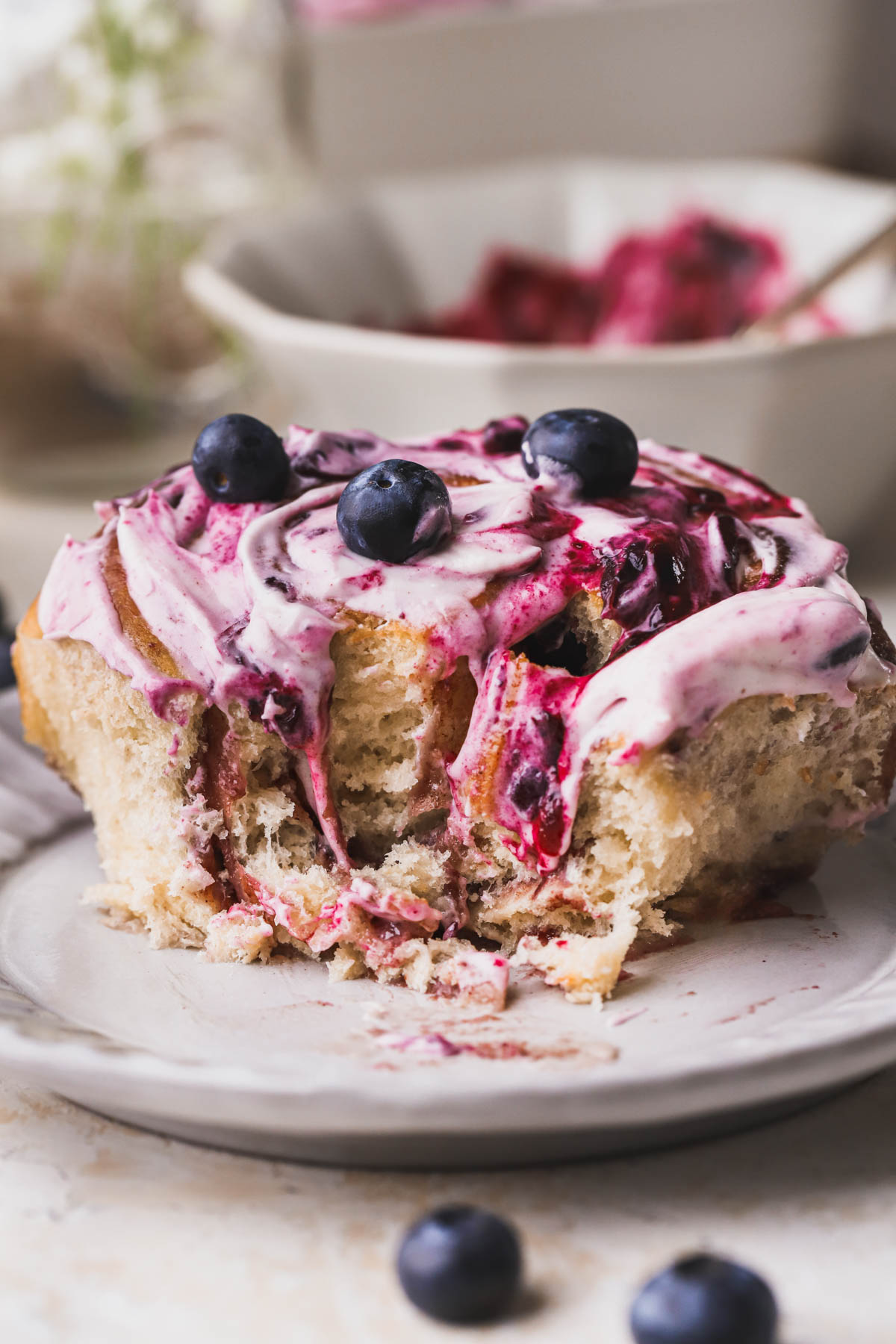 Blueberry cinnamon rolls with blueberry cream cheese frosting. 