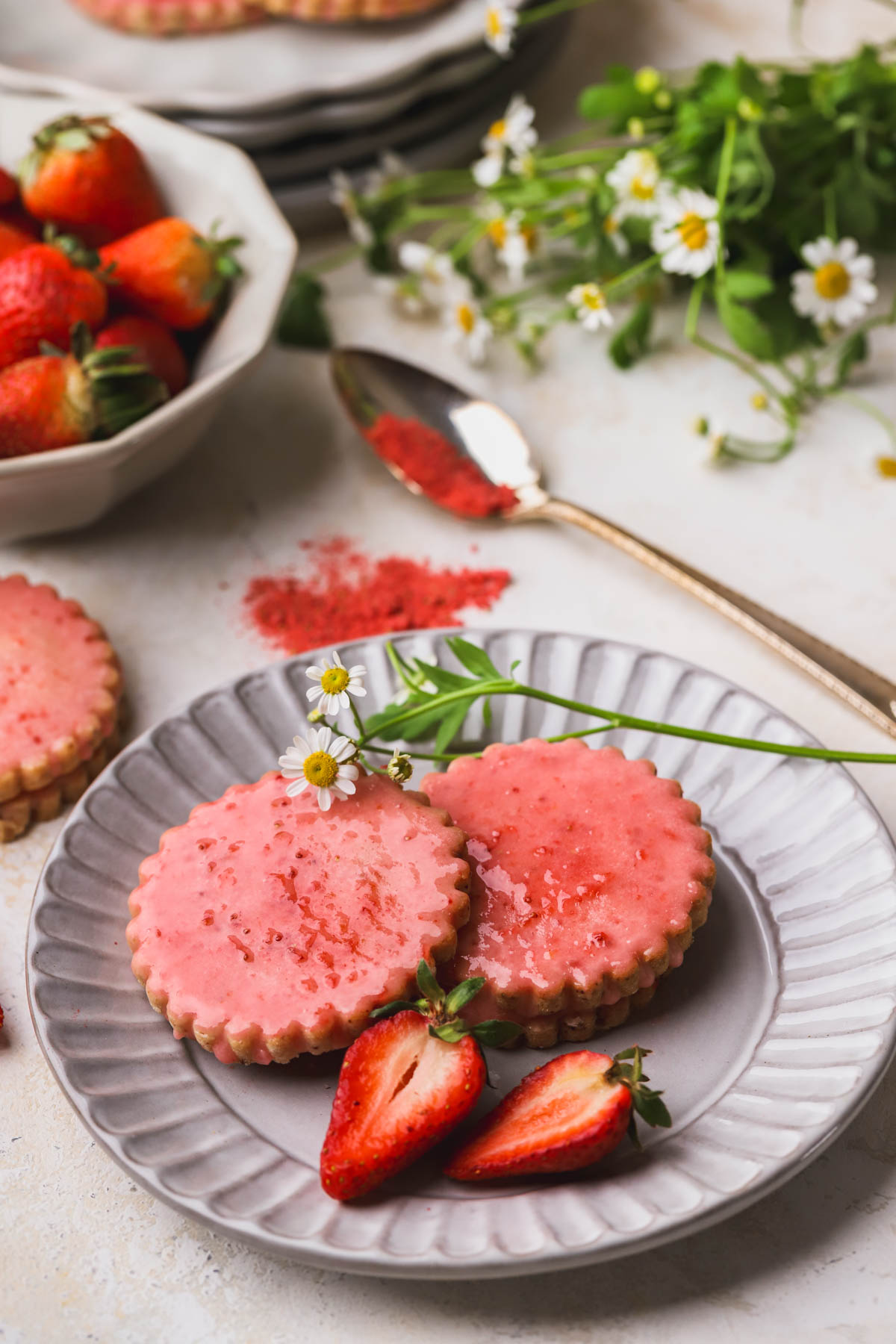 Shortbread cookies topped with fresh strawberry glaze. 