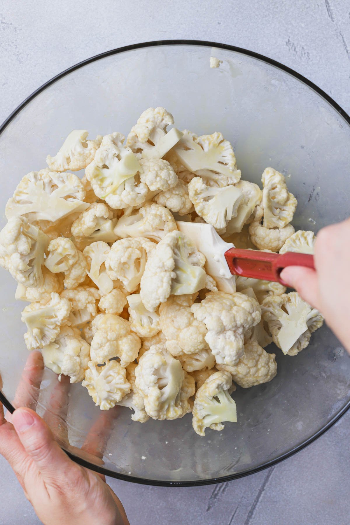 Cauliflower florets coated in egg.  