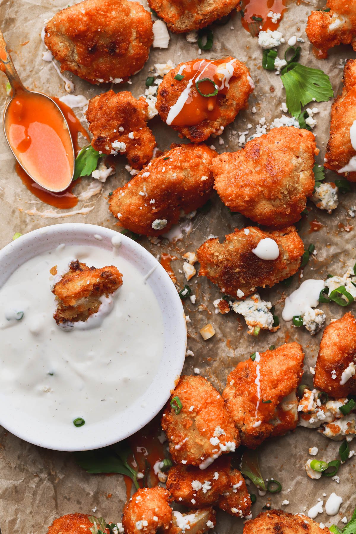 Crispy cauliflower bites coated with buffalo sauce, blue cheese and ranch dressing.