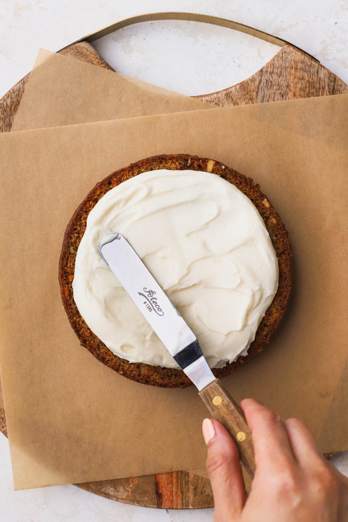 Carrot cake topped with cream cheese frosting. 