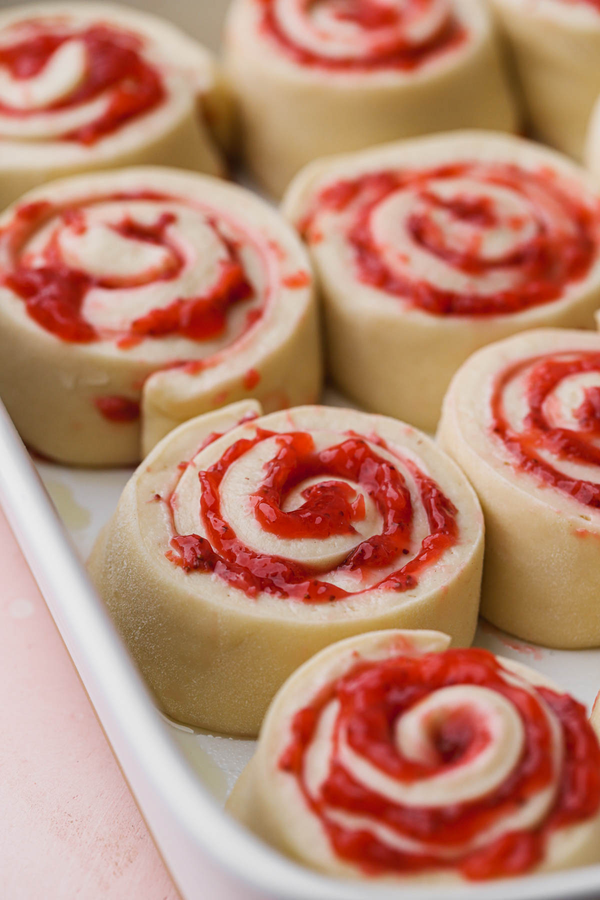 Rolled up dough with strawberry filling. 