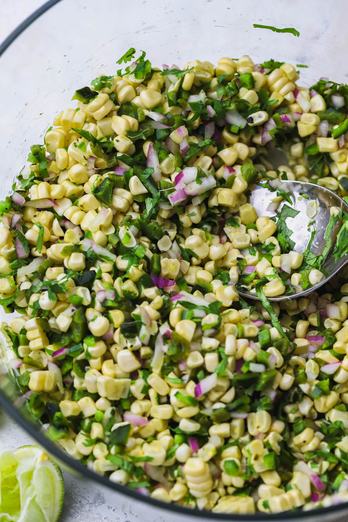 Raw corn, red onions, cilantro, jalapenos, poblano peppers, lime juice and salt. 
