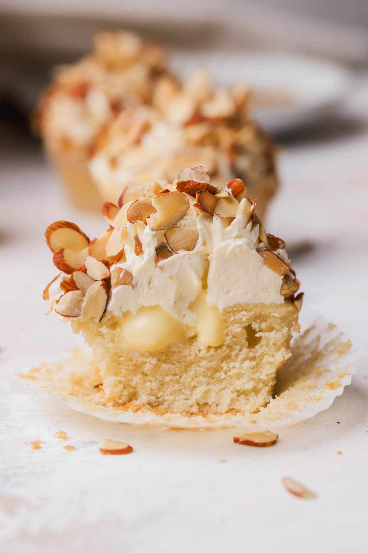 Almond cupcakes filled with vanilla pastry cream, German buttercream and toasted almonds. 