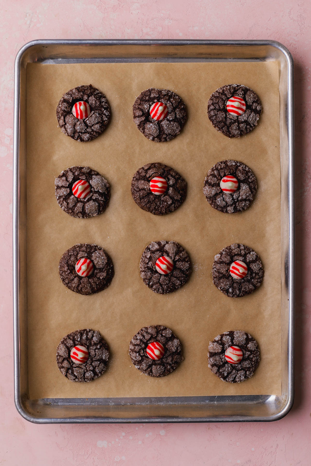 Baked chocolate sugar cookies with peppermint Hershey kisses.  