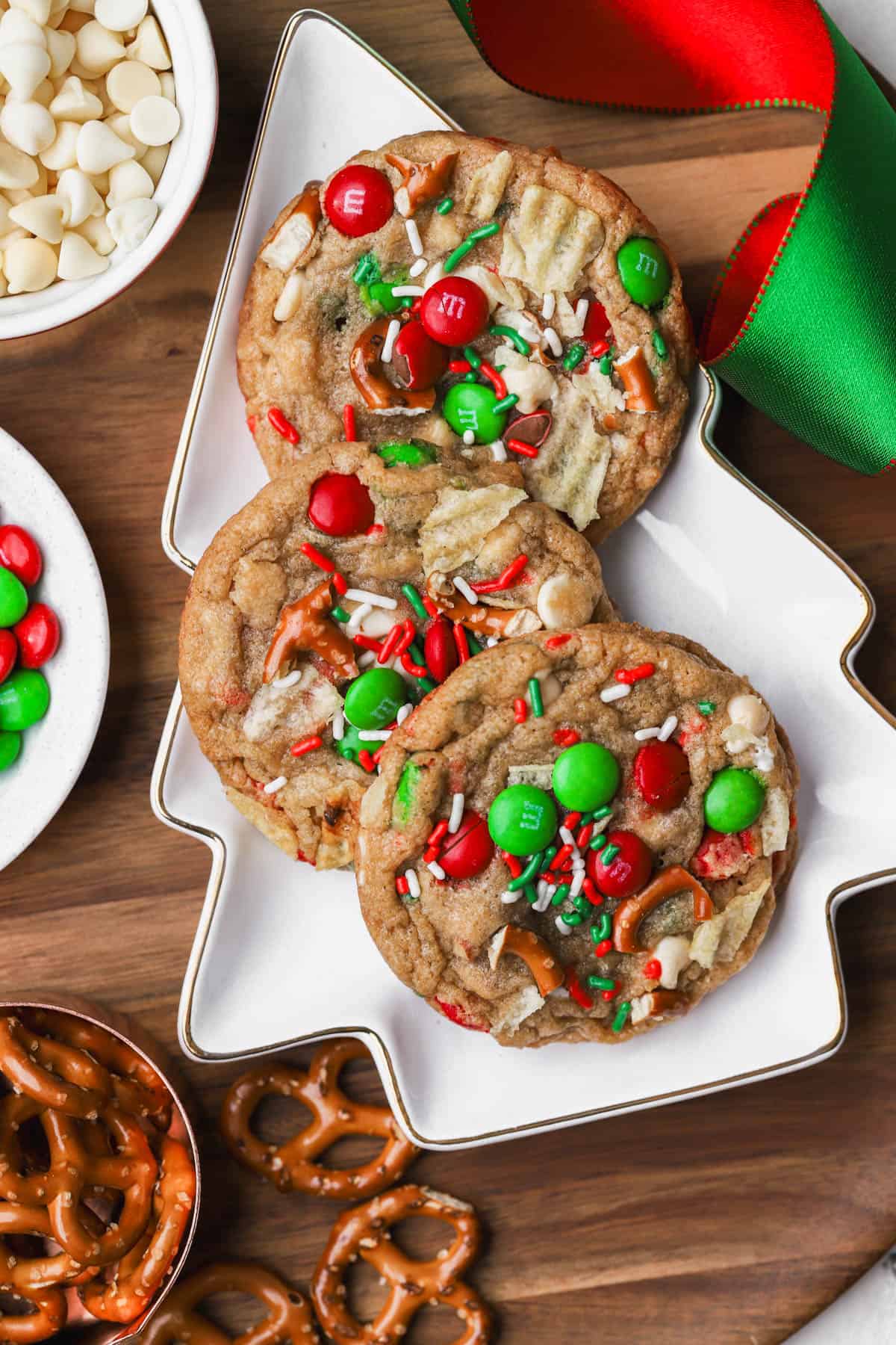 Kitchen sink Christmas cookies with holiday sprinkles, M&M's, pretzels, potato chips and white chocolate. 