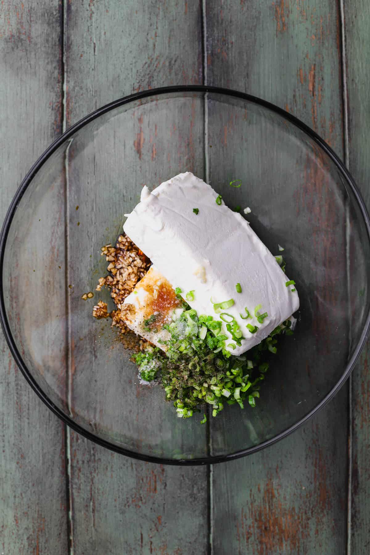 Cream Cheese, garlic, soy sauce, Worcestershire, green onions, sugar.