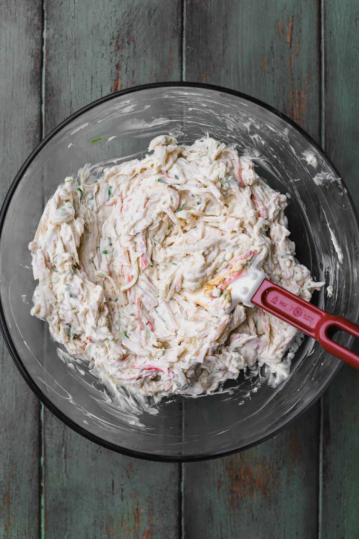 Cream Cheese, garlic, soy sauce, Worcestershire, green onions, sugar and shredded crab meat. 