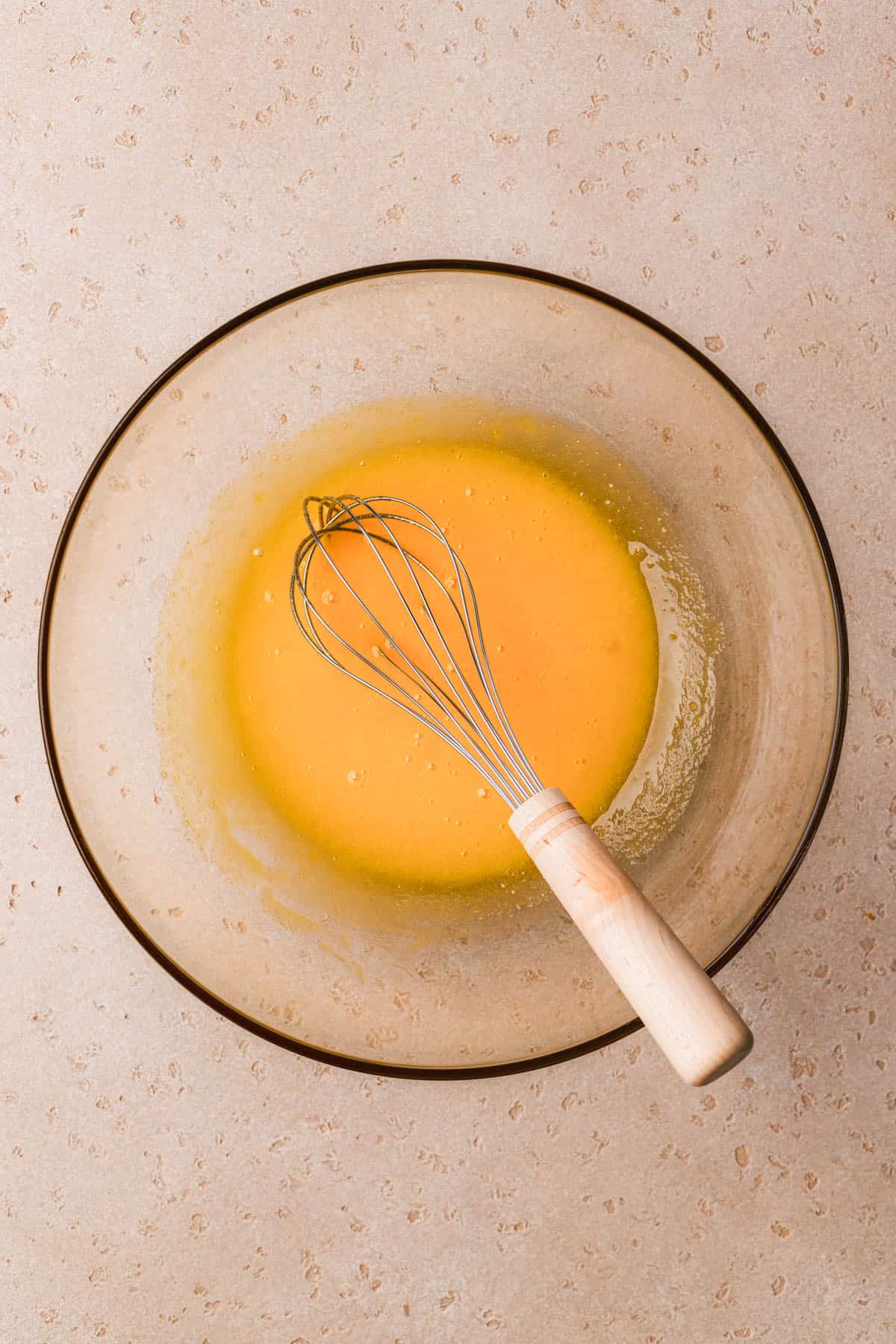 Mixed egg yolks, sugar and salt. 