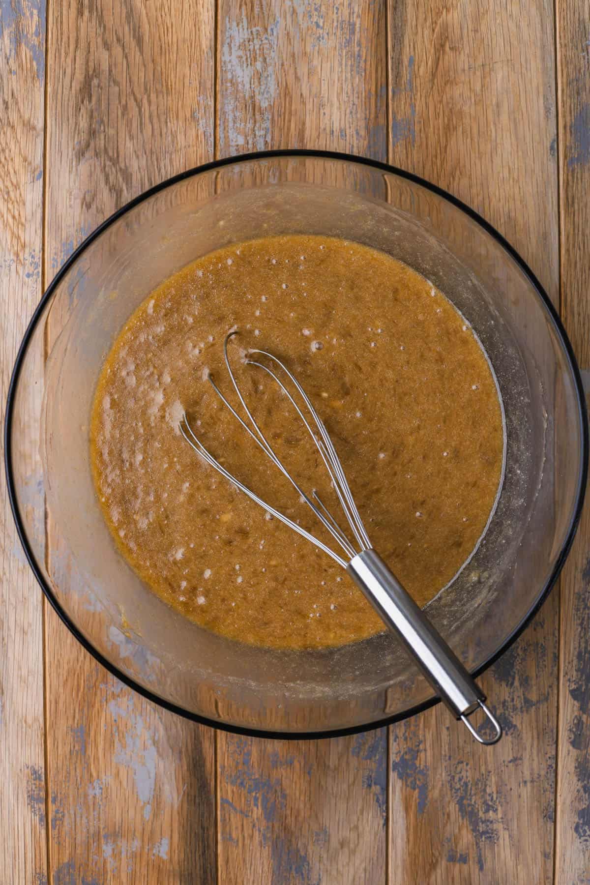 Smashed bananas, brown sugar, melted butter, eggs, vanilla extract. 