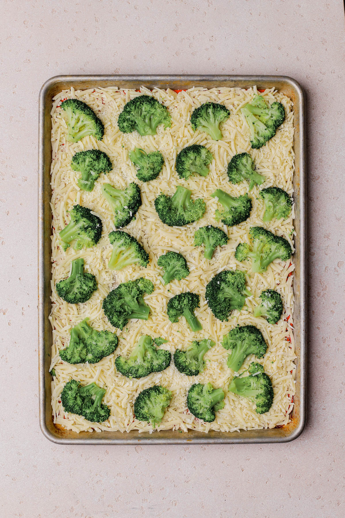 Shredded cheese with broccoli. 