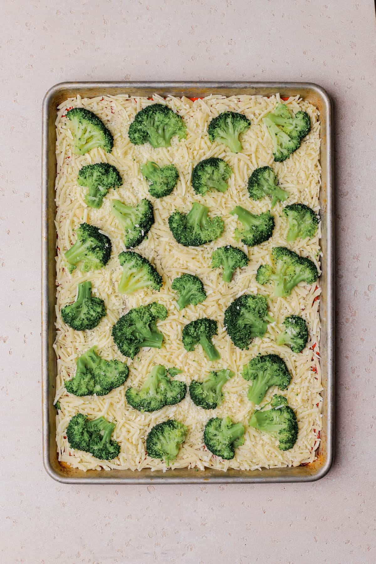 Shredded cheese with broccoli. 