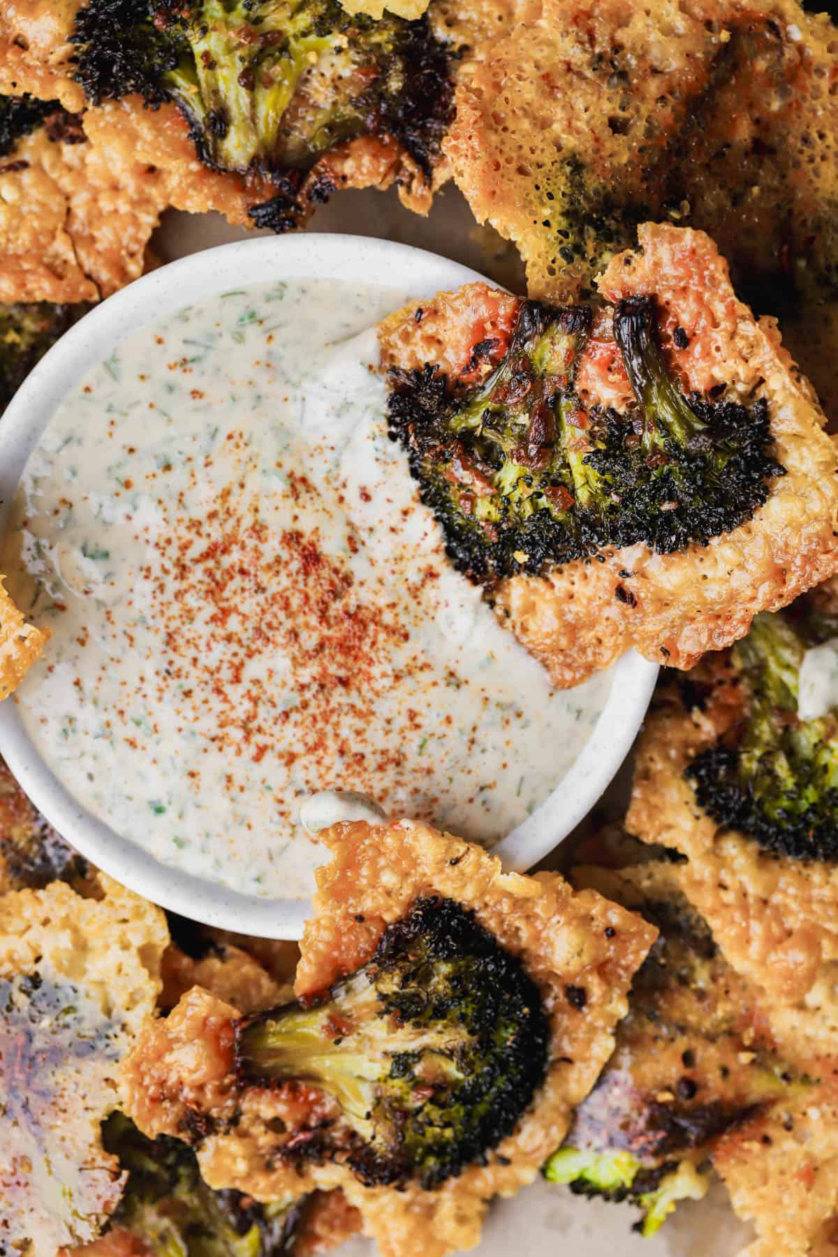 Smashed parmesan broccoli crisps with tahini ranch. 