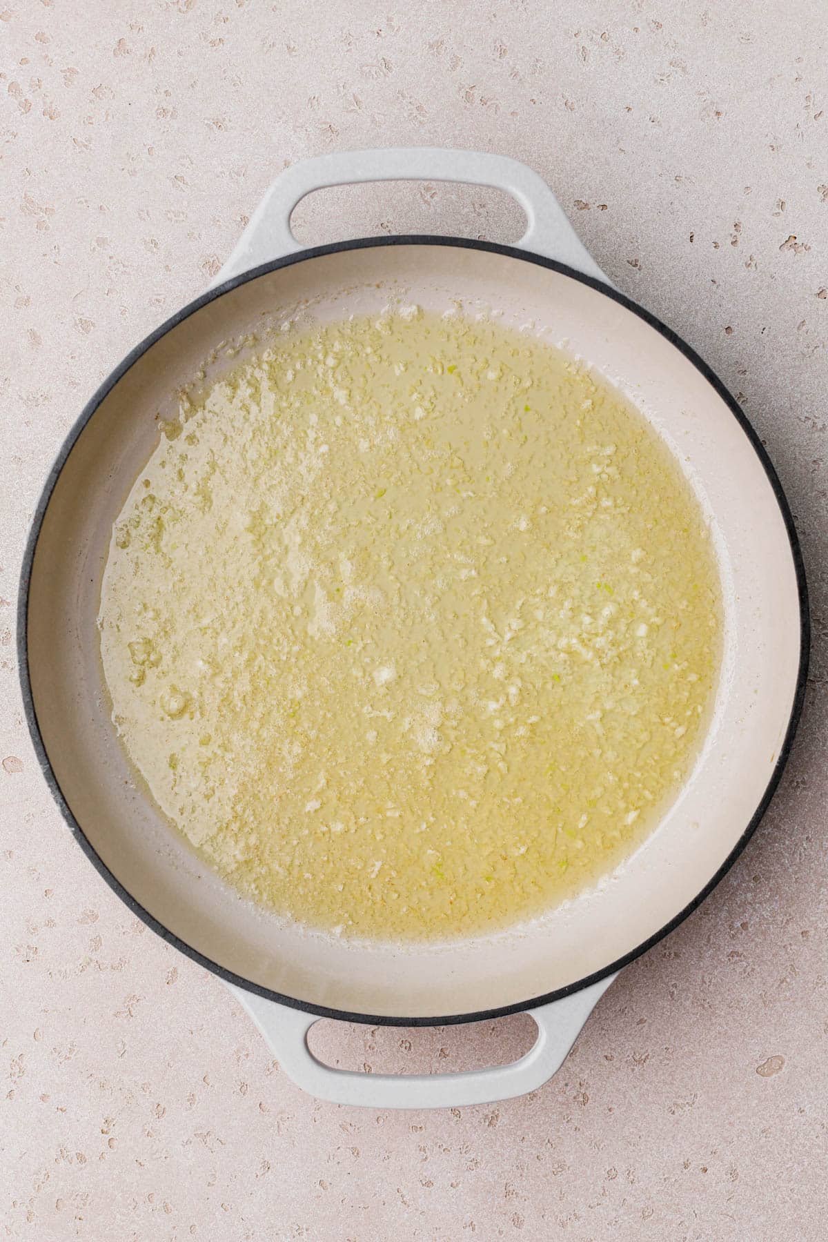 Melted butter, garlic, and white wine. 