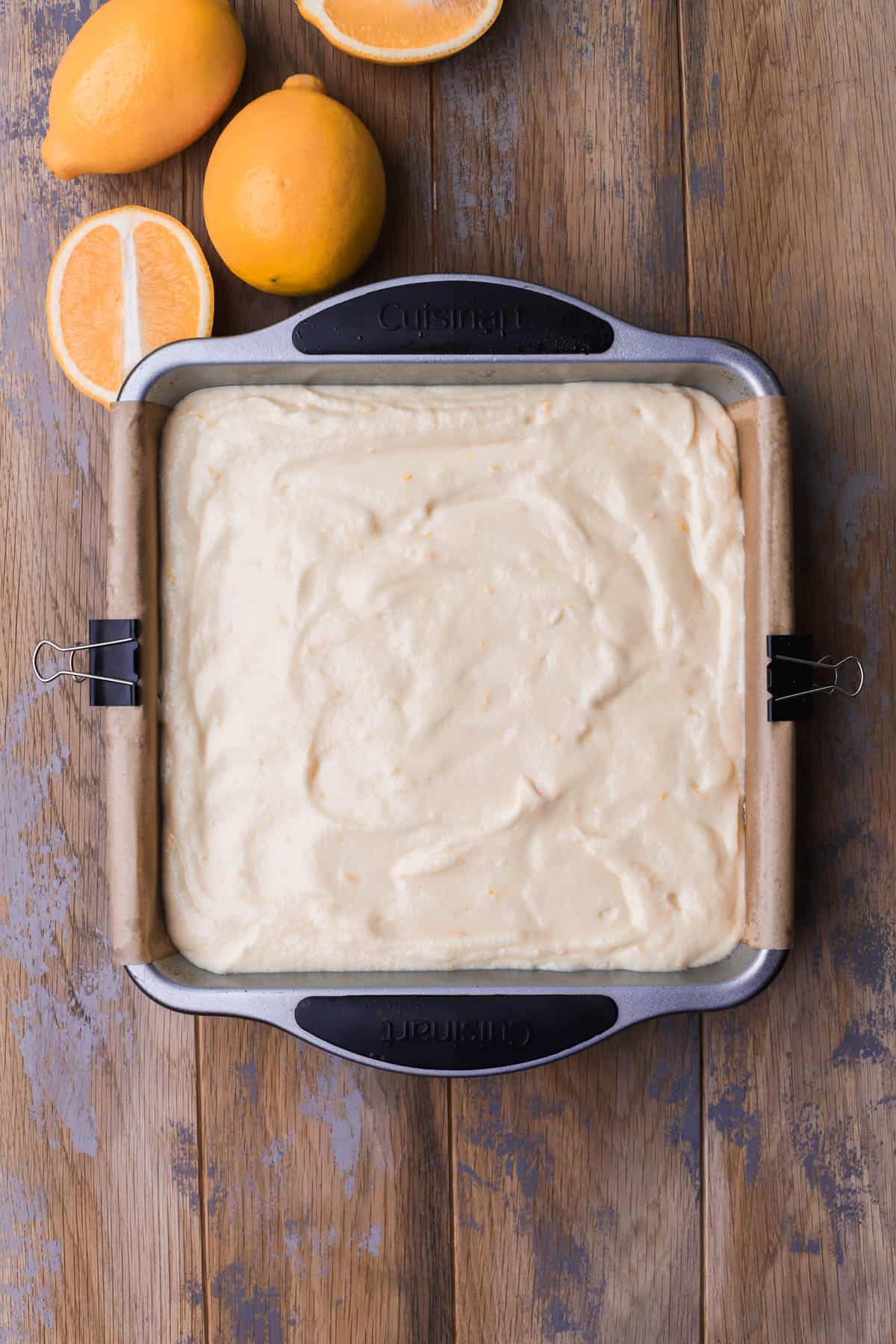 Lemon cake batter poured into baking pan.