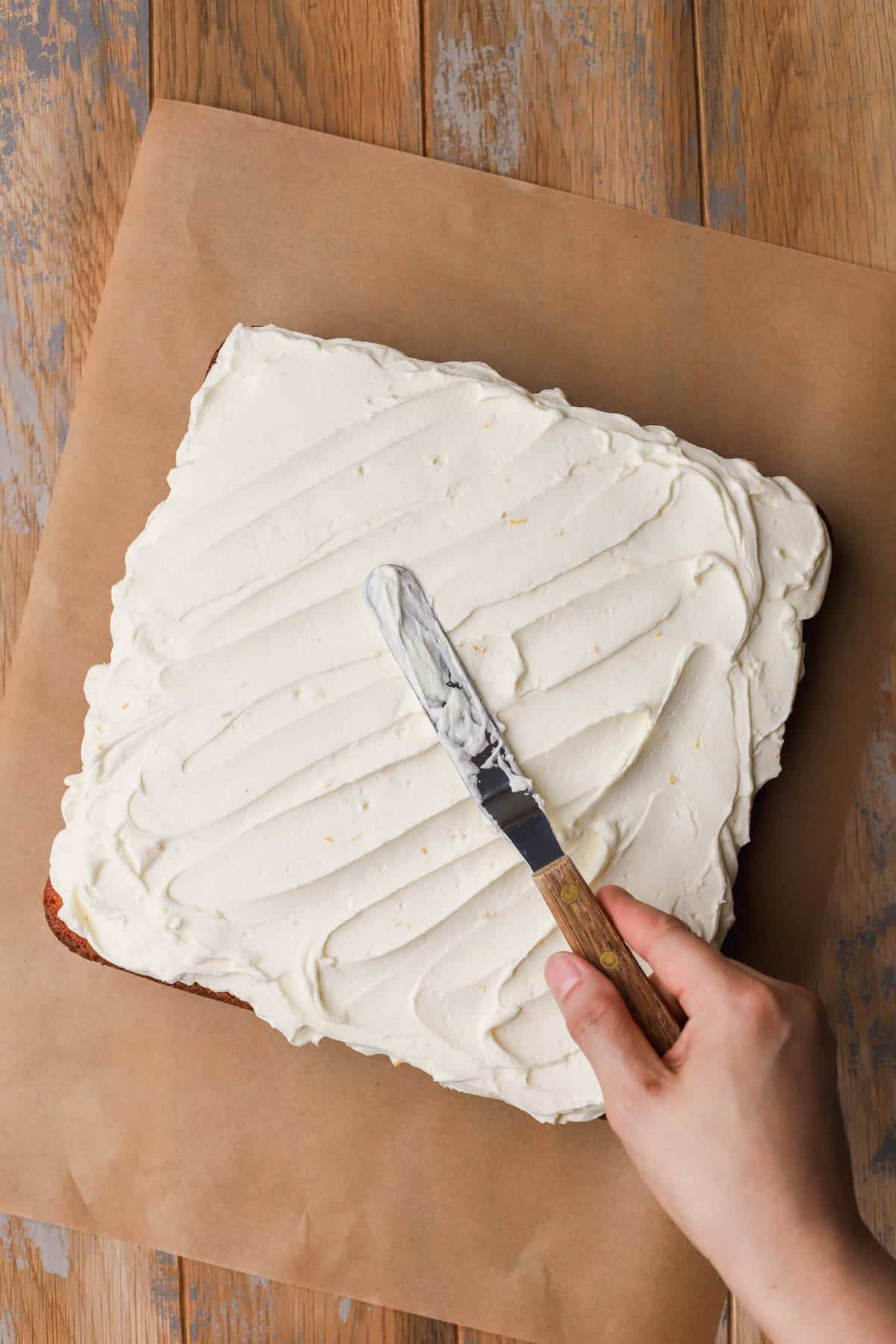 Lemon cake topped with mascarpone frosting.