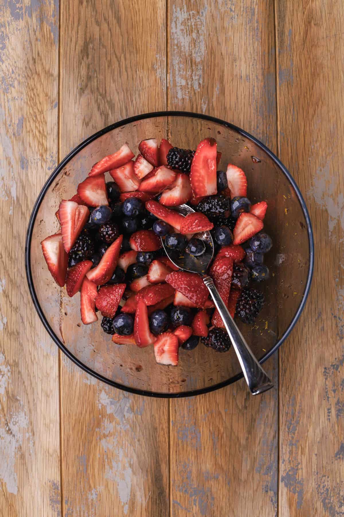 Fresh berries tossed with strawberry jam.