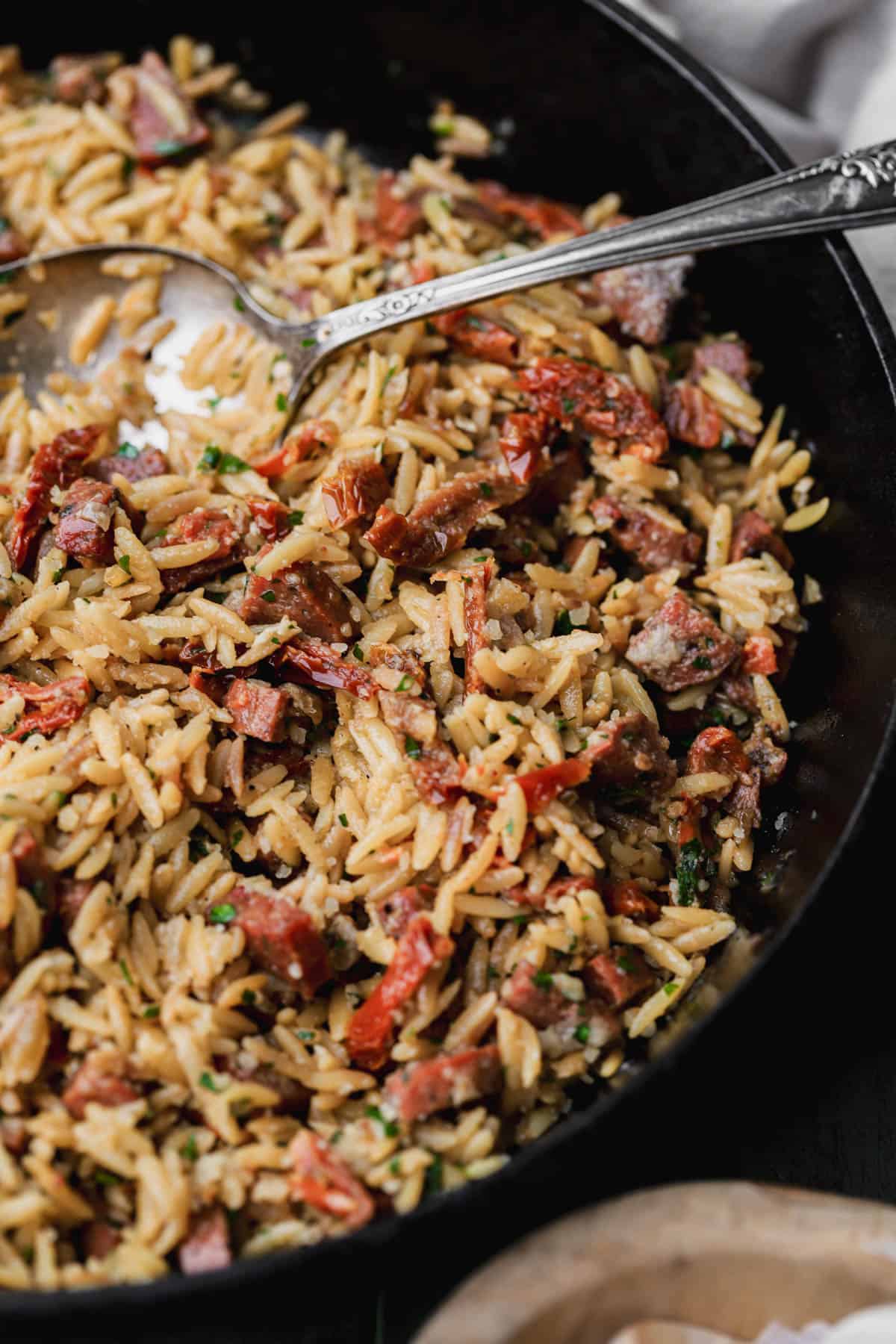 One pot orzo with sun-dried tomatoes, parmesan and chorizo.