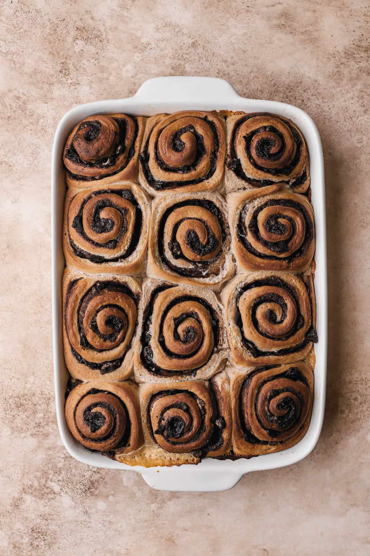 Baked cinnamon rolls with Oreos. 