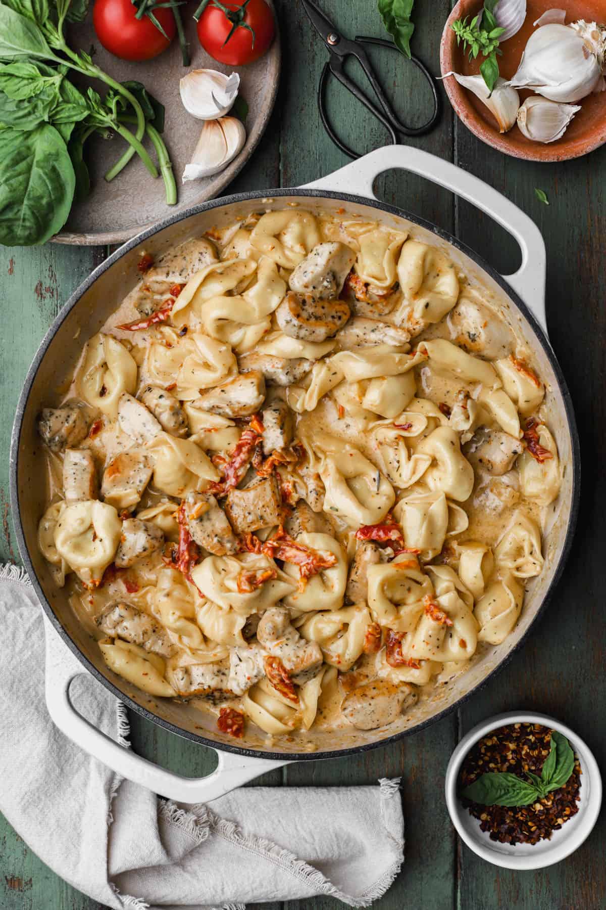 Cooked tortellini in creamy parmesan sauce with sun-dried tomatoes.  