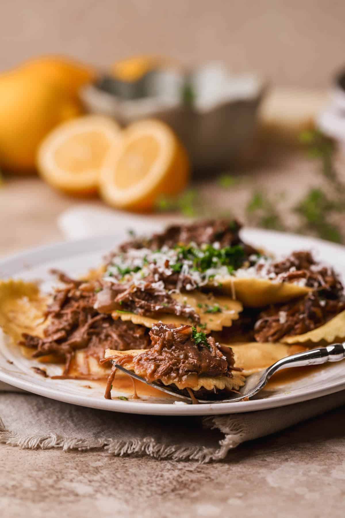 Lemon and ricotta ravioli with slow cooker short ribs, parmesan and gremolata.