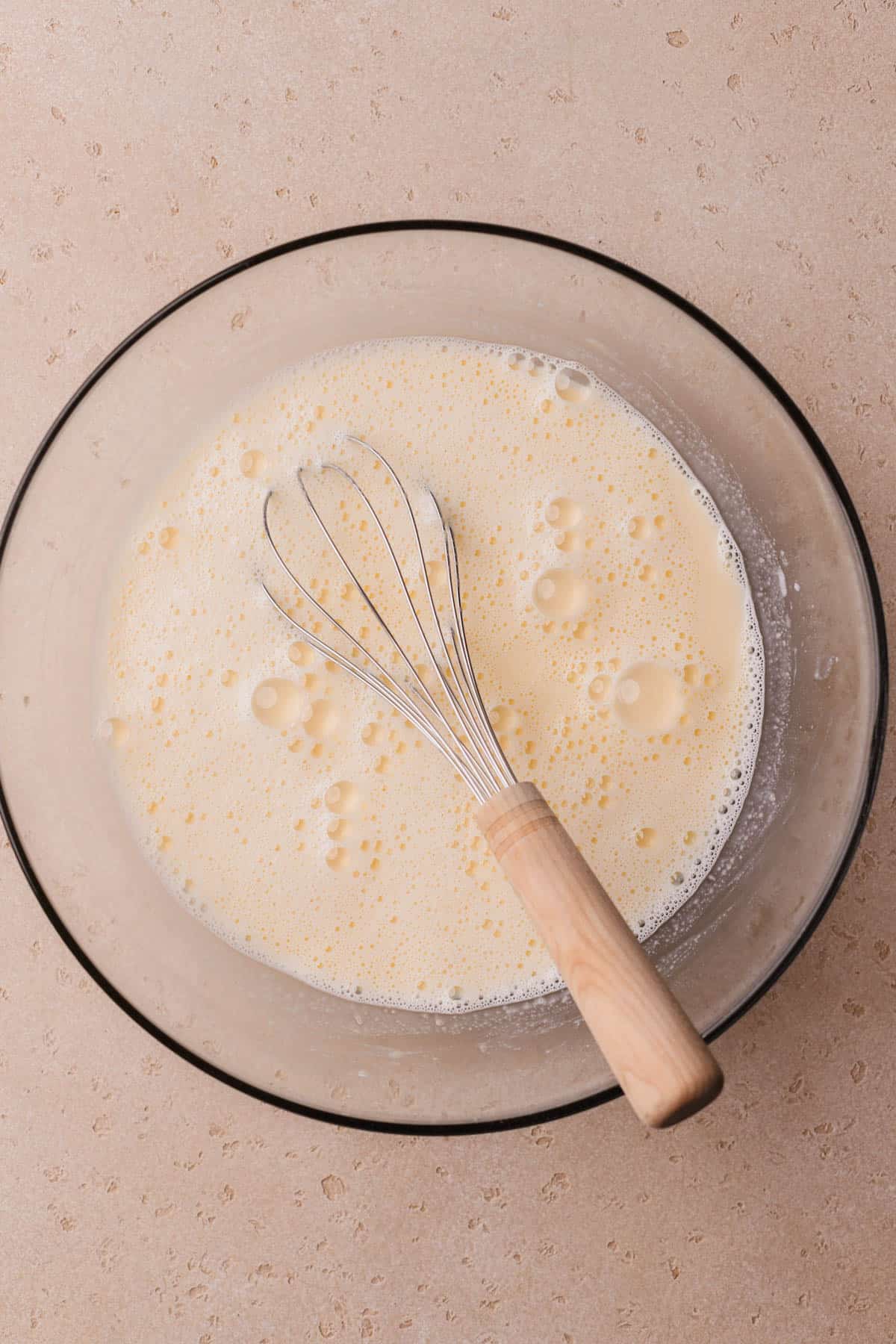 Egg yolks, whole milk, sugar, vanilla bean paste and whole milk. 